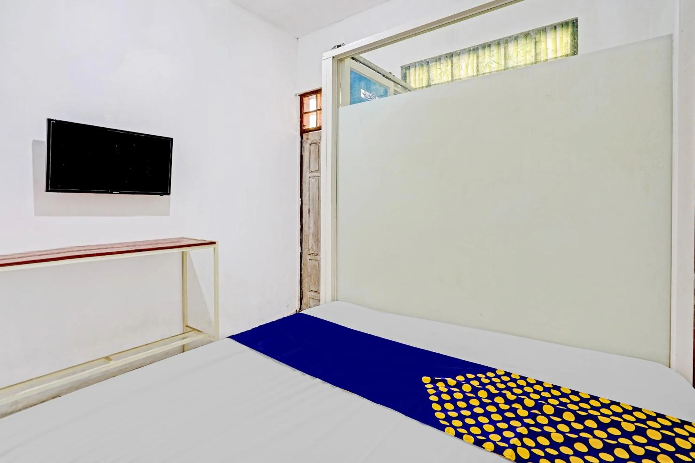 Bedroom in SPOT ON 90586 Hagawa Syariah Homestay