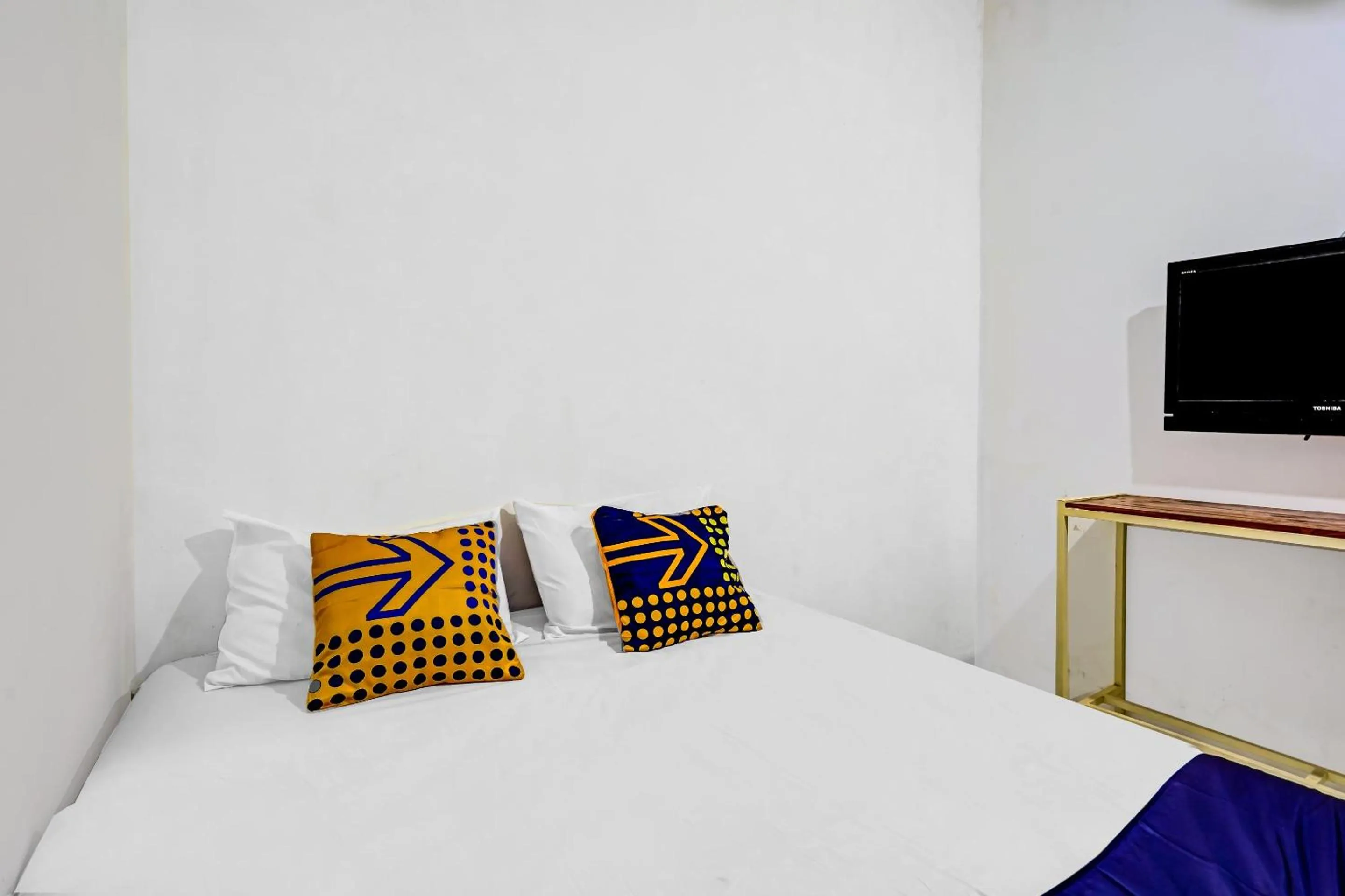 Bedroom in SPOT ON 90586 Hagawa Syariah Homestay