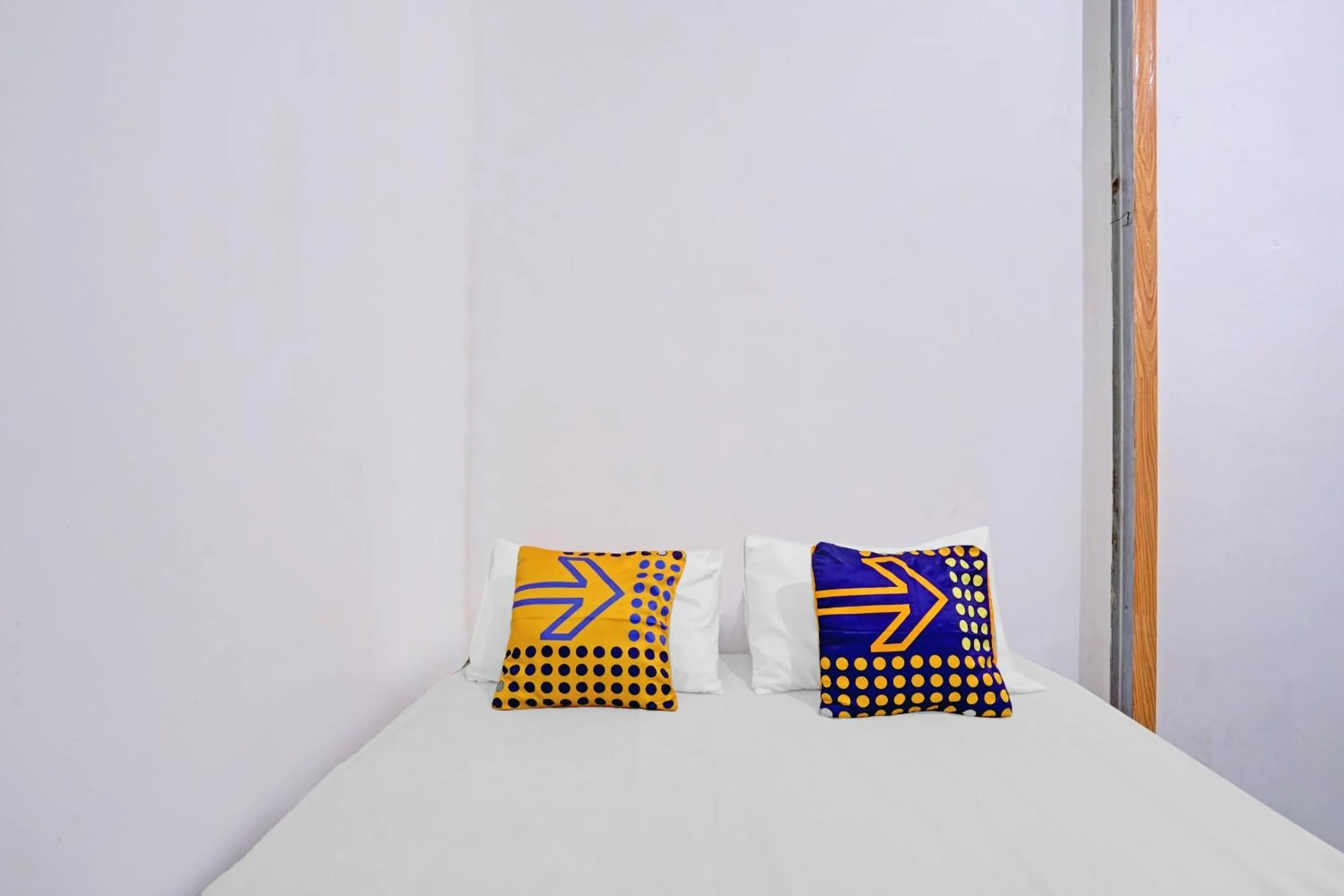 Bedroom in SPOT ON 90586 Hagawa Syariah Homestay