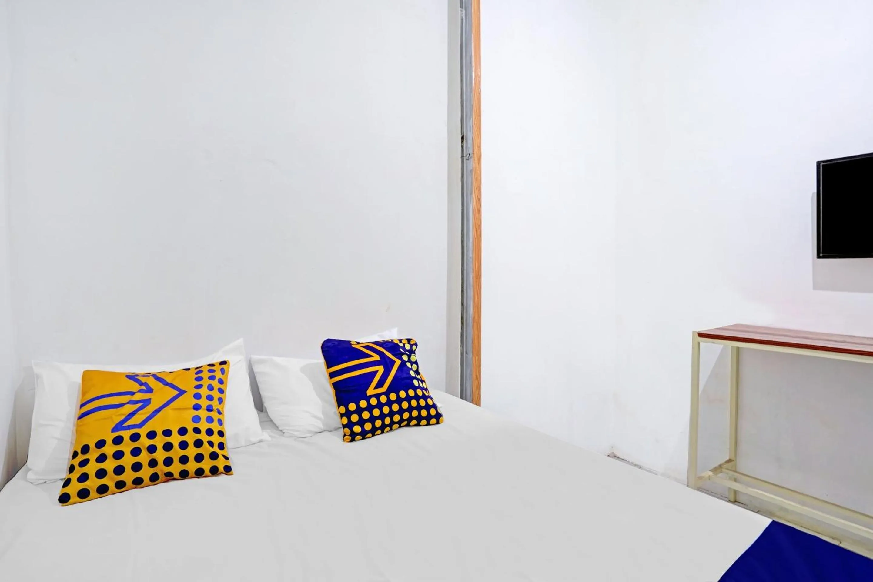 Bedroom in SPOT ON 90586 Hagawa Syariah Homestay