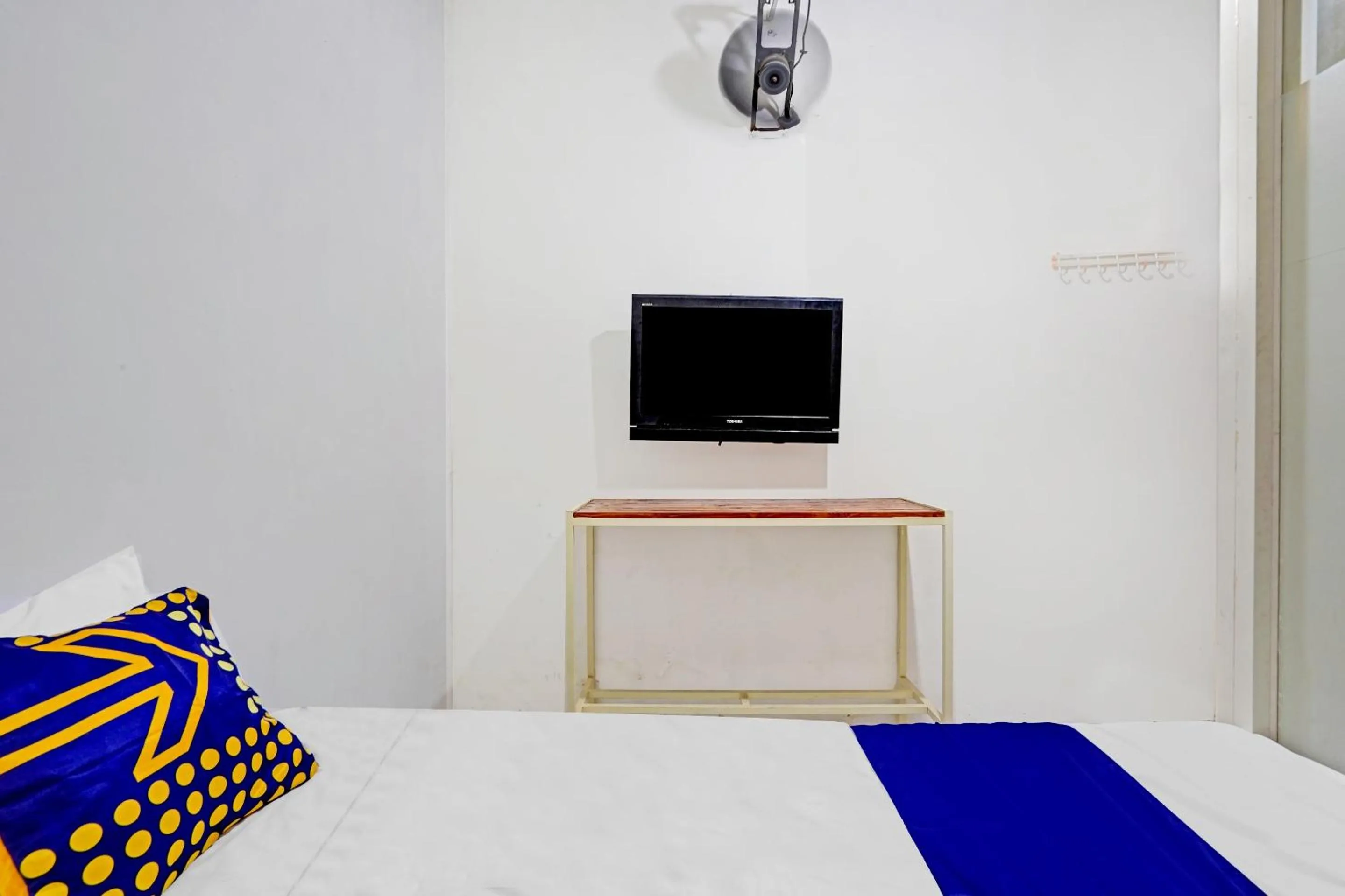 Bedroom in SPOT ON 90586 Hagawa Syariah Homestay