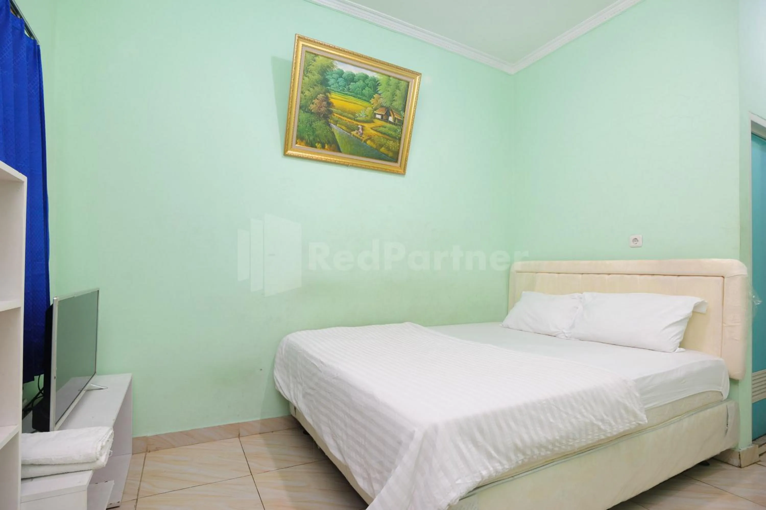 Bed in OYO 90594 Fajar Inn