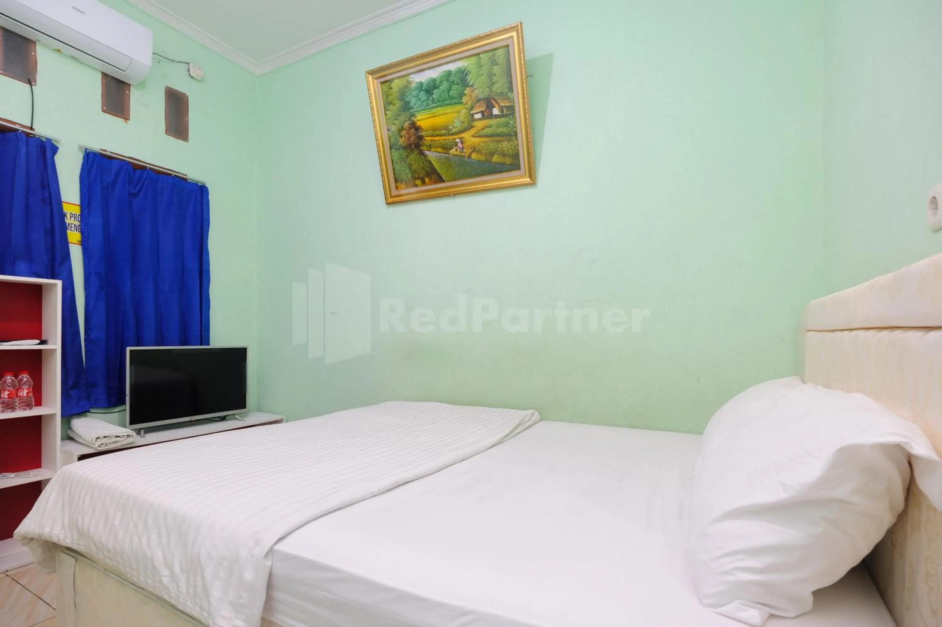 Bed in OYO 90594 Fajar Inn