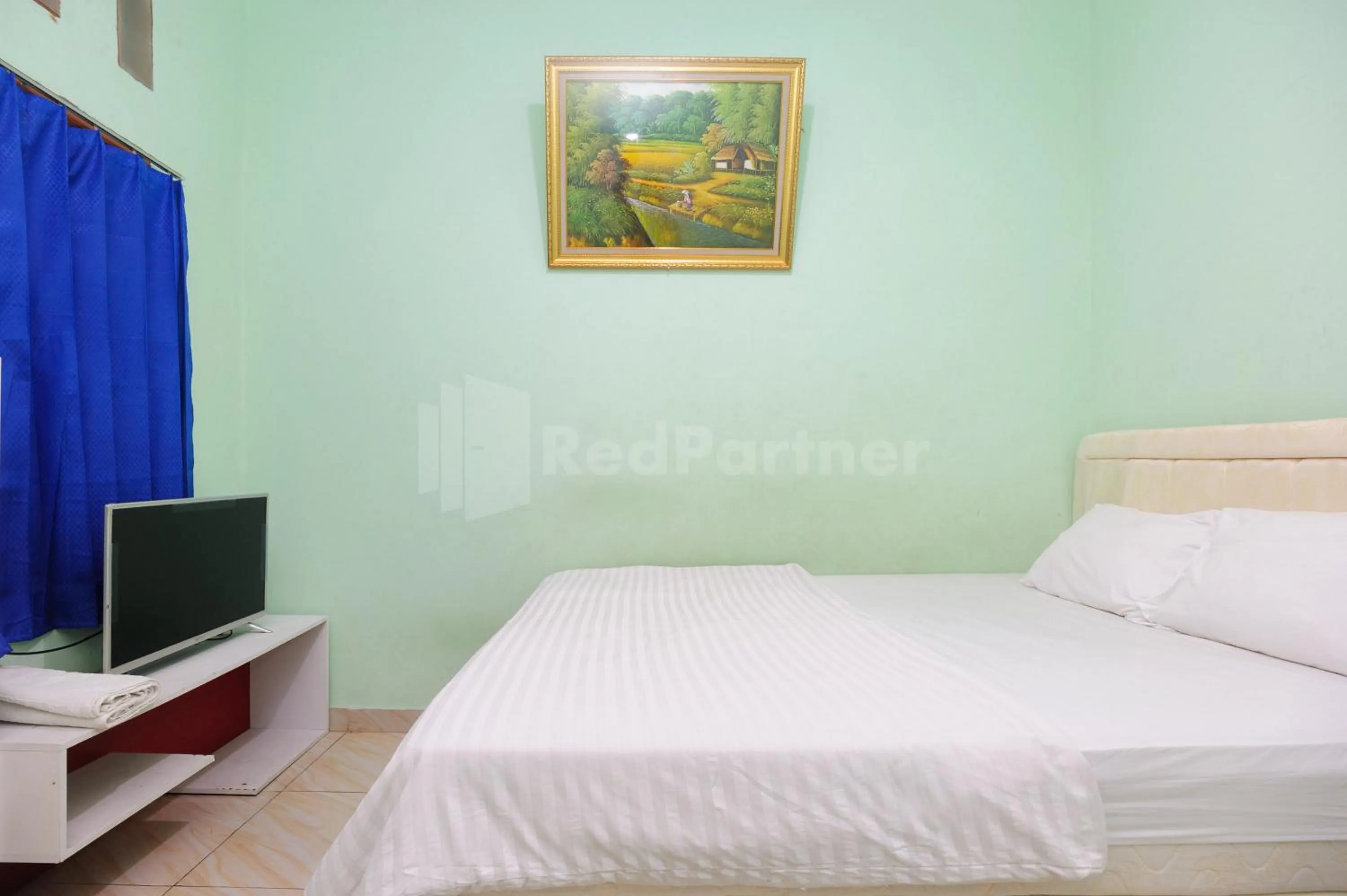 Bed in OYO 90594 Fajar Inn