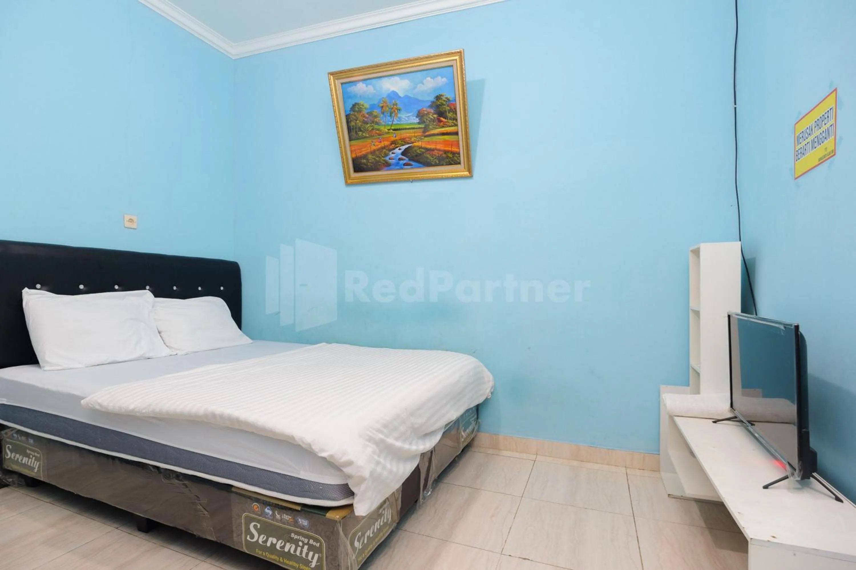 Bed in OYO 90594 Fajar Inn