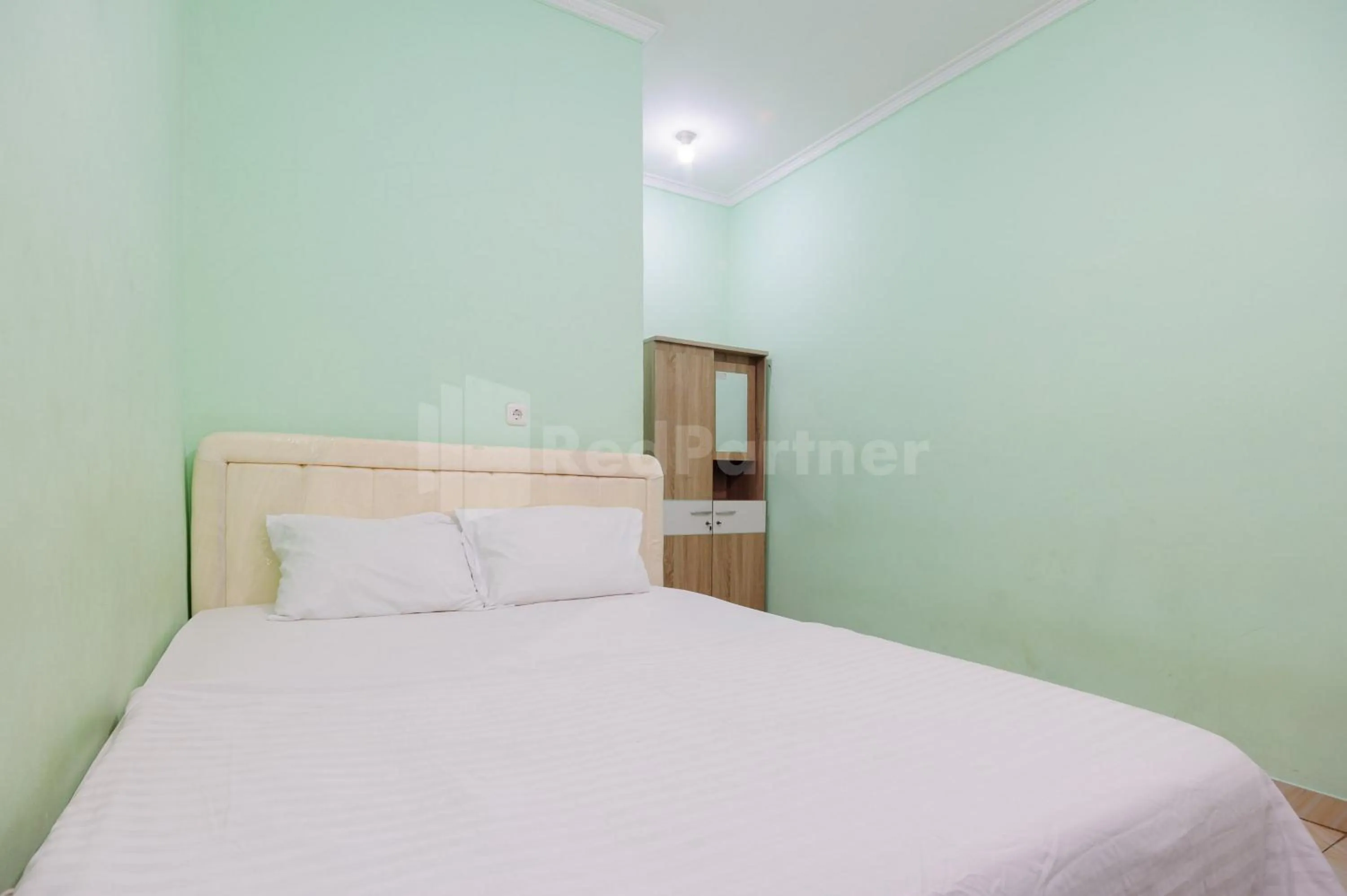 Bed in OYO 90594 Fajar Inn