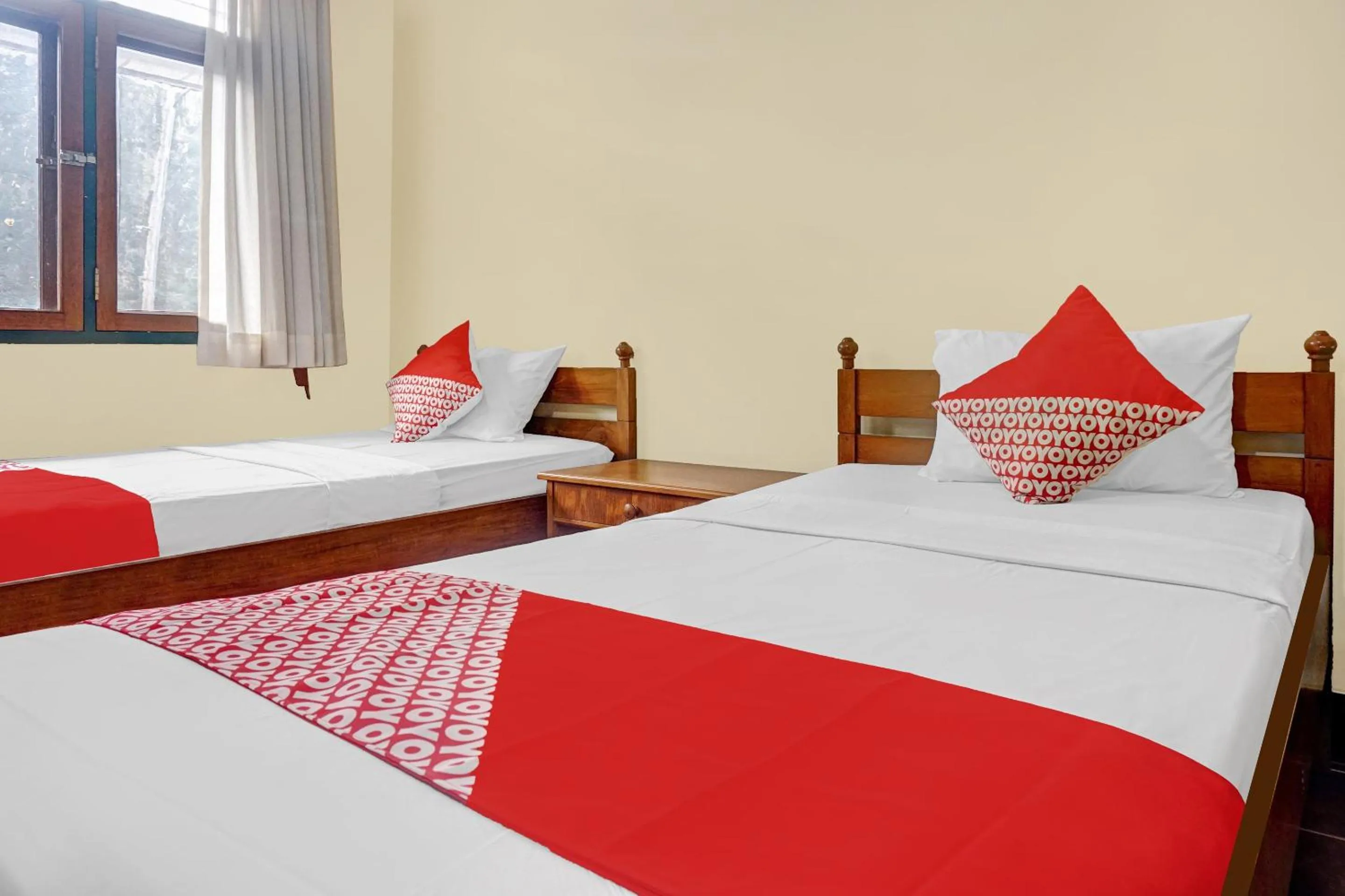 Bed in Hotel O 90596 Hotel Griya Astoeti