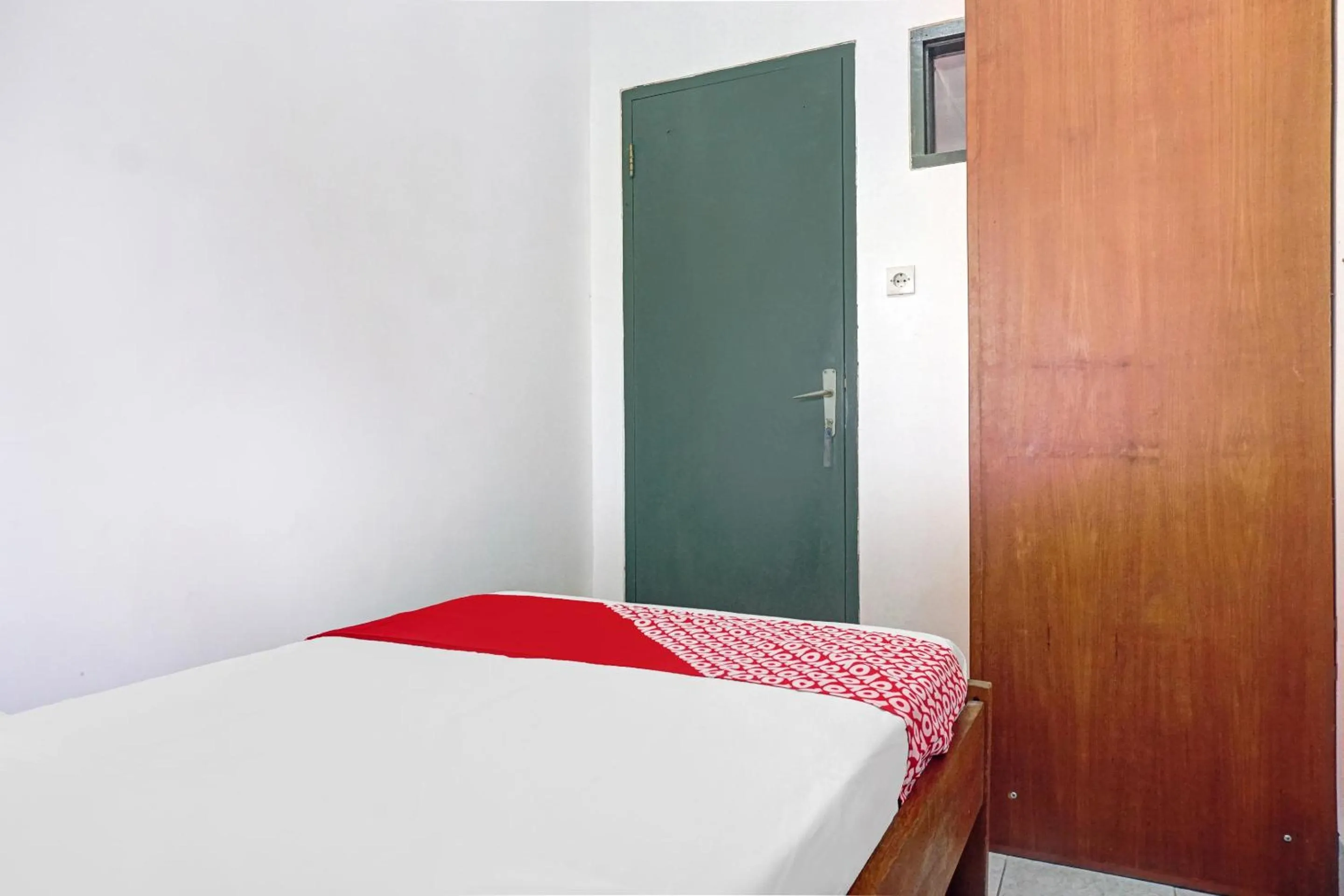 Bed in Hotel O 90596 Hotel Griya Astoeti