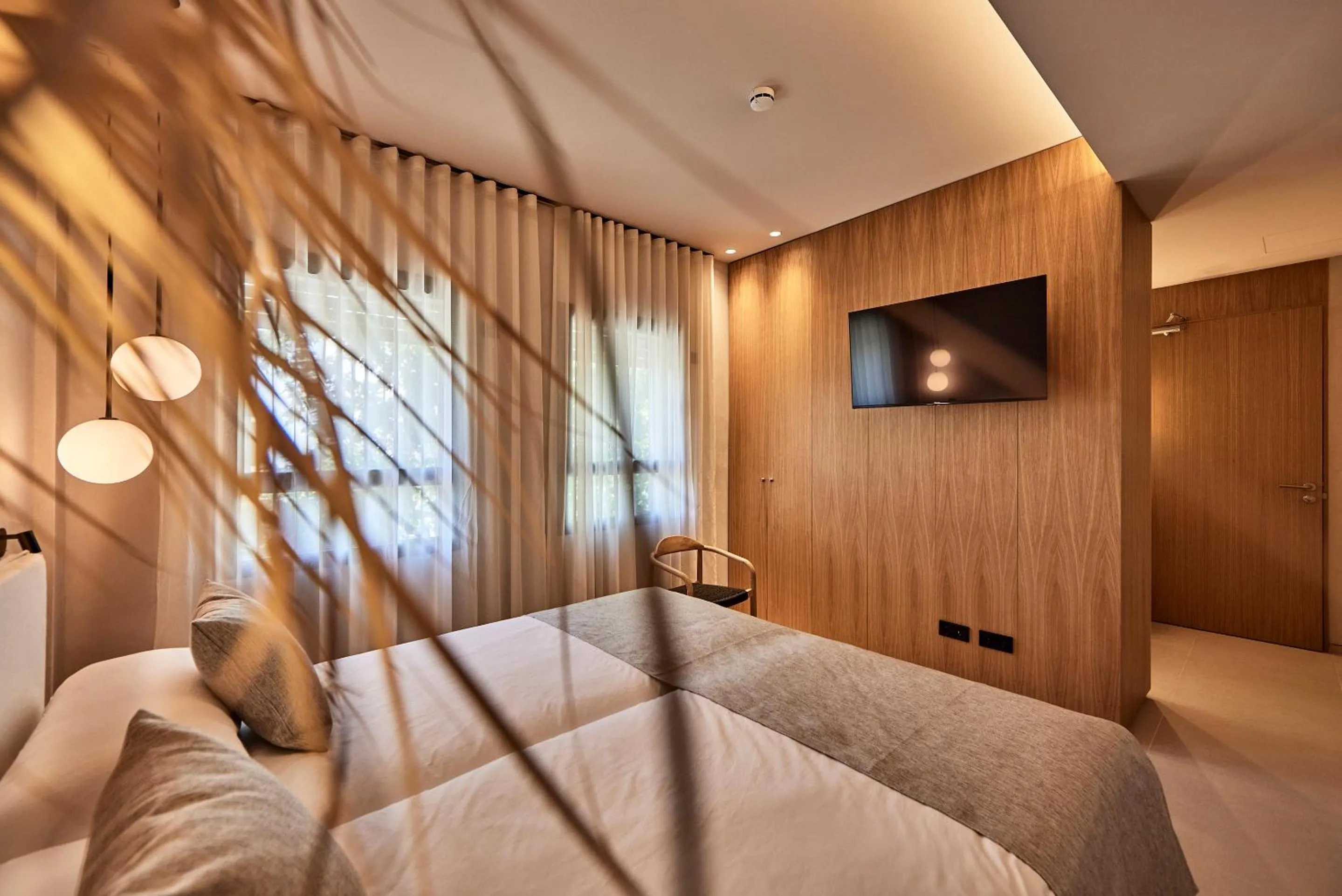 Bed in JOE'S GOMILA BOUTIQUE HOTEL