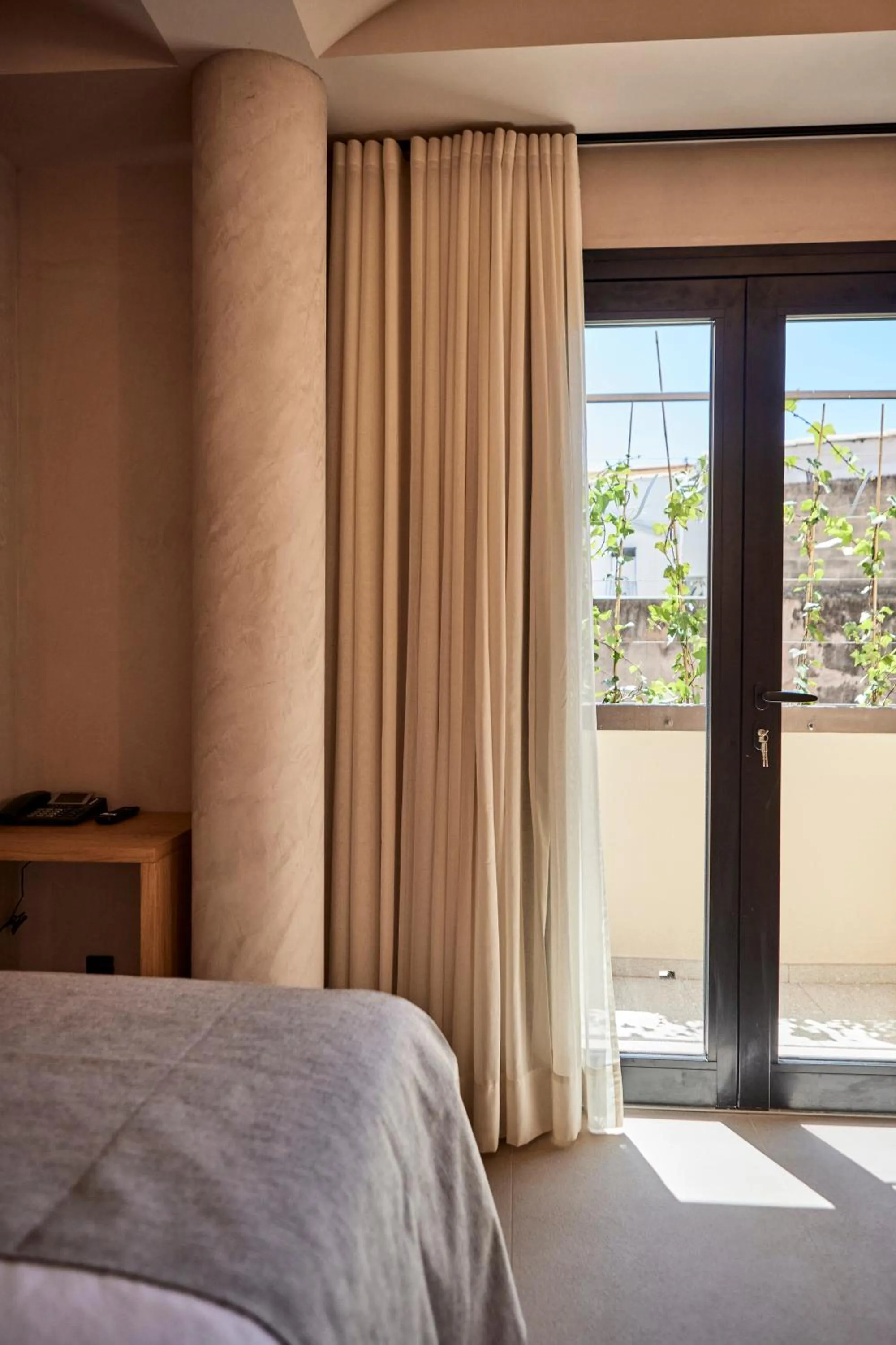 Balcony/Terrace, Bed in JOE'S GOMILA BOUTIQUE HOTEL