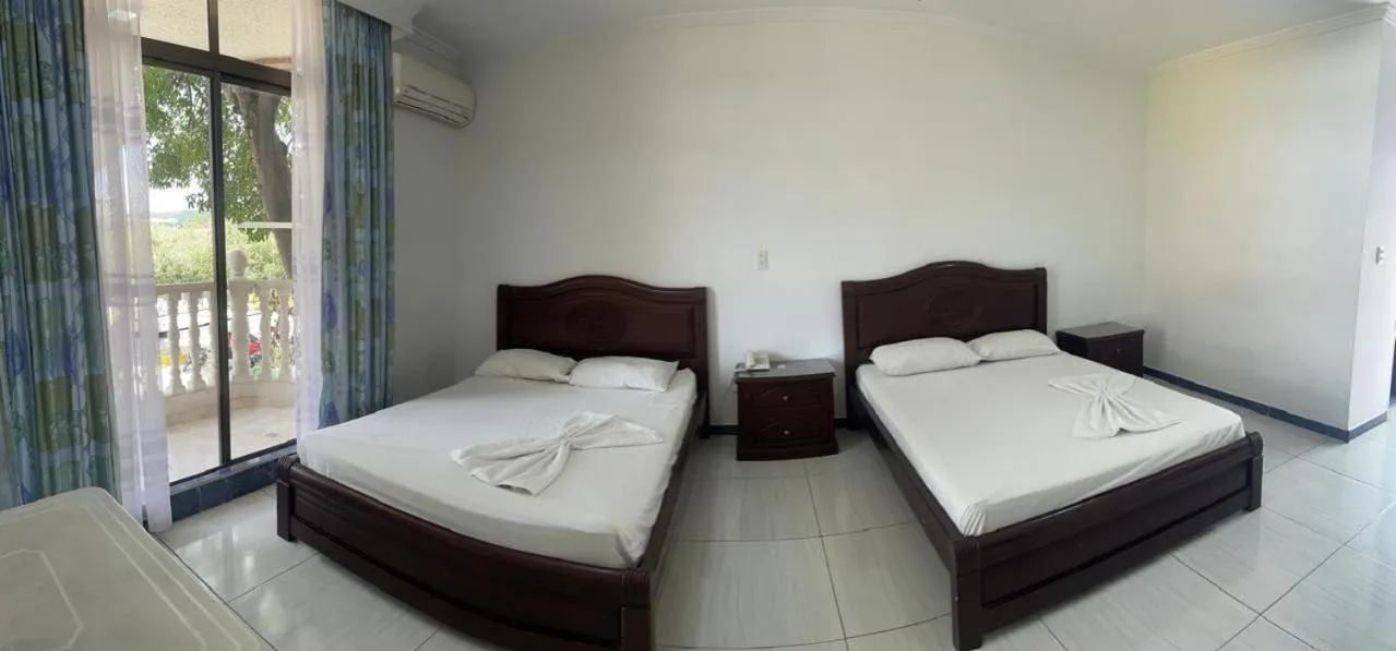 Bed in Zahira Hotel Melgar