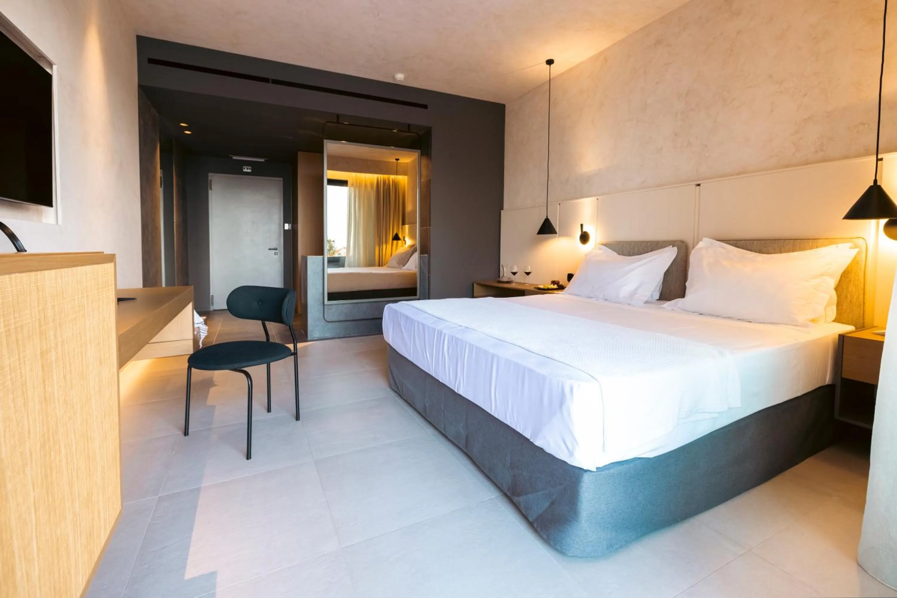 Bed in Anasa Luxury Resort