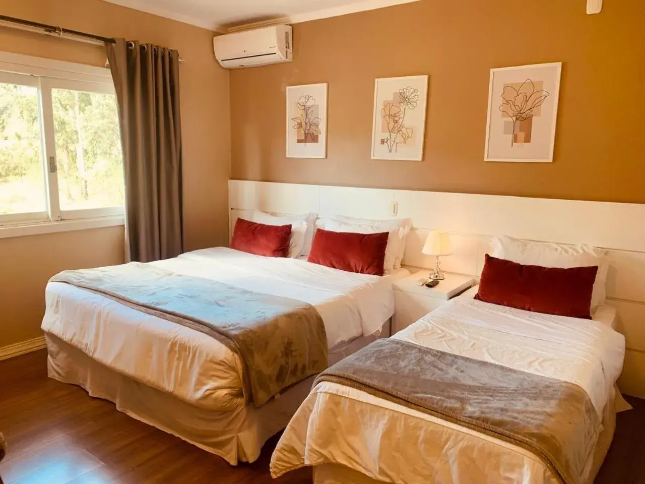 Deluxe Triple Room in Pousada Quinta do Vale Deluxe Triple Room in Pousada Quinta do Vale