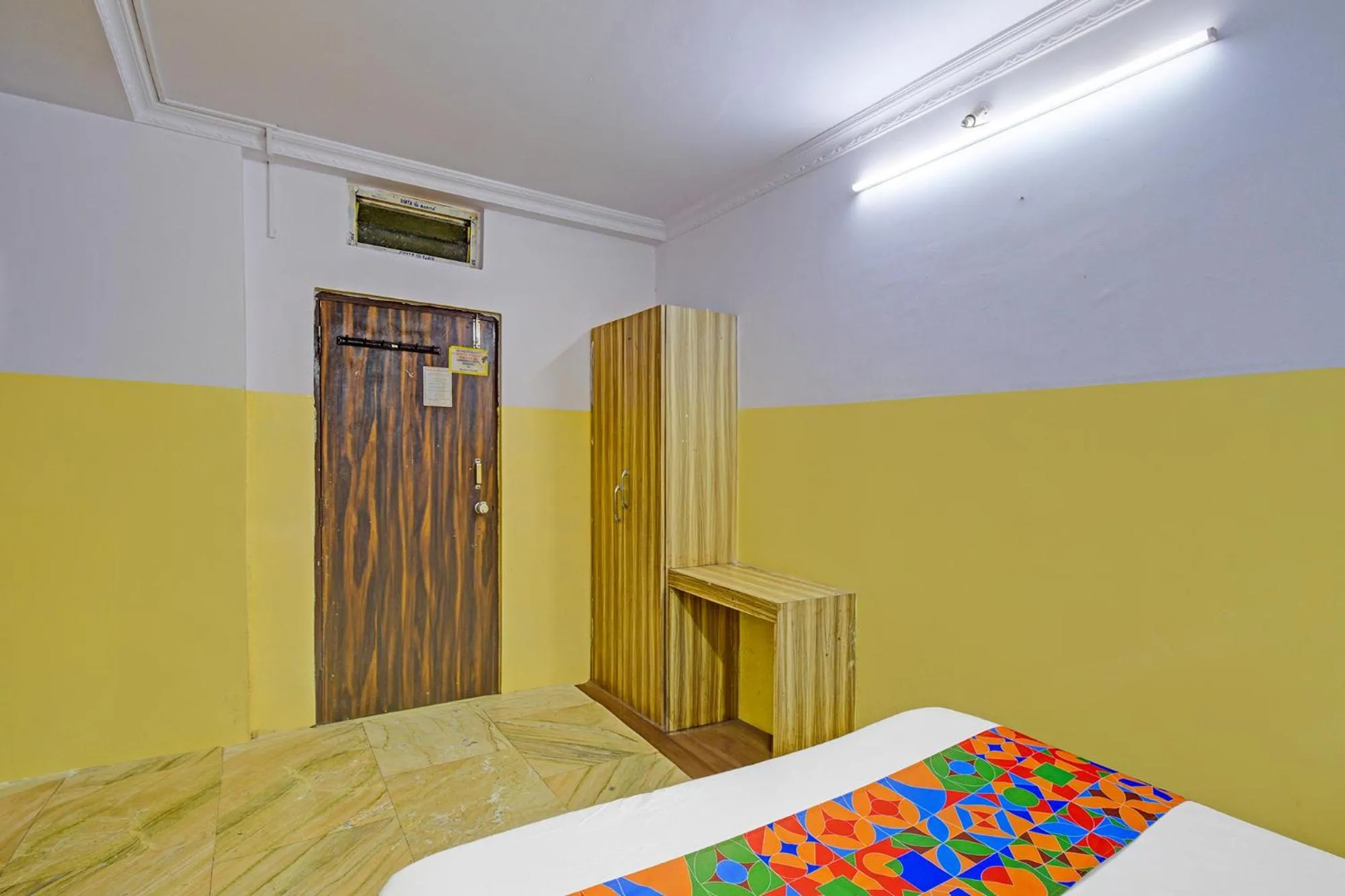 Bed in FabHotel Mohith Gokul