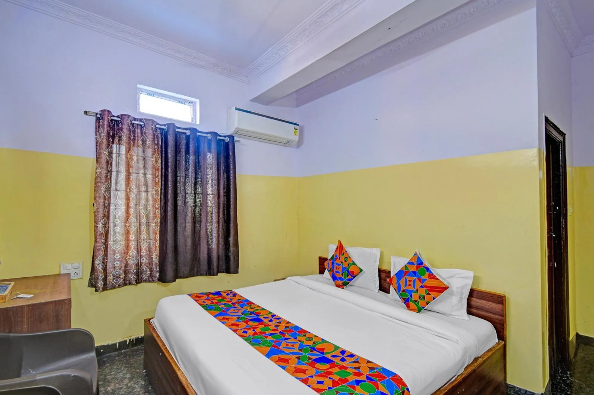 Bed in FabHotel Mohith Gokul