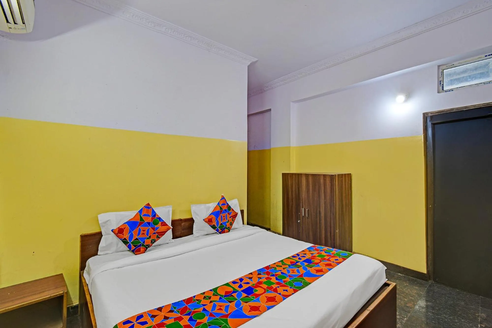 Bed in FabHotel Mohith Gokul