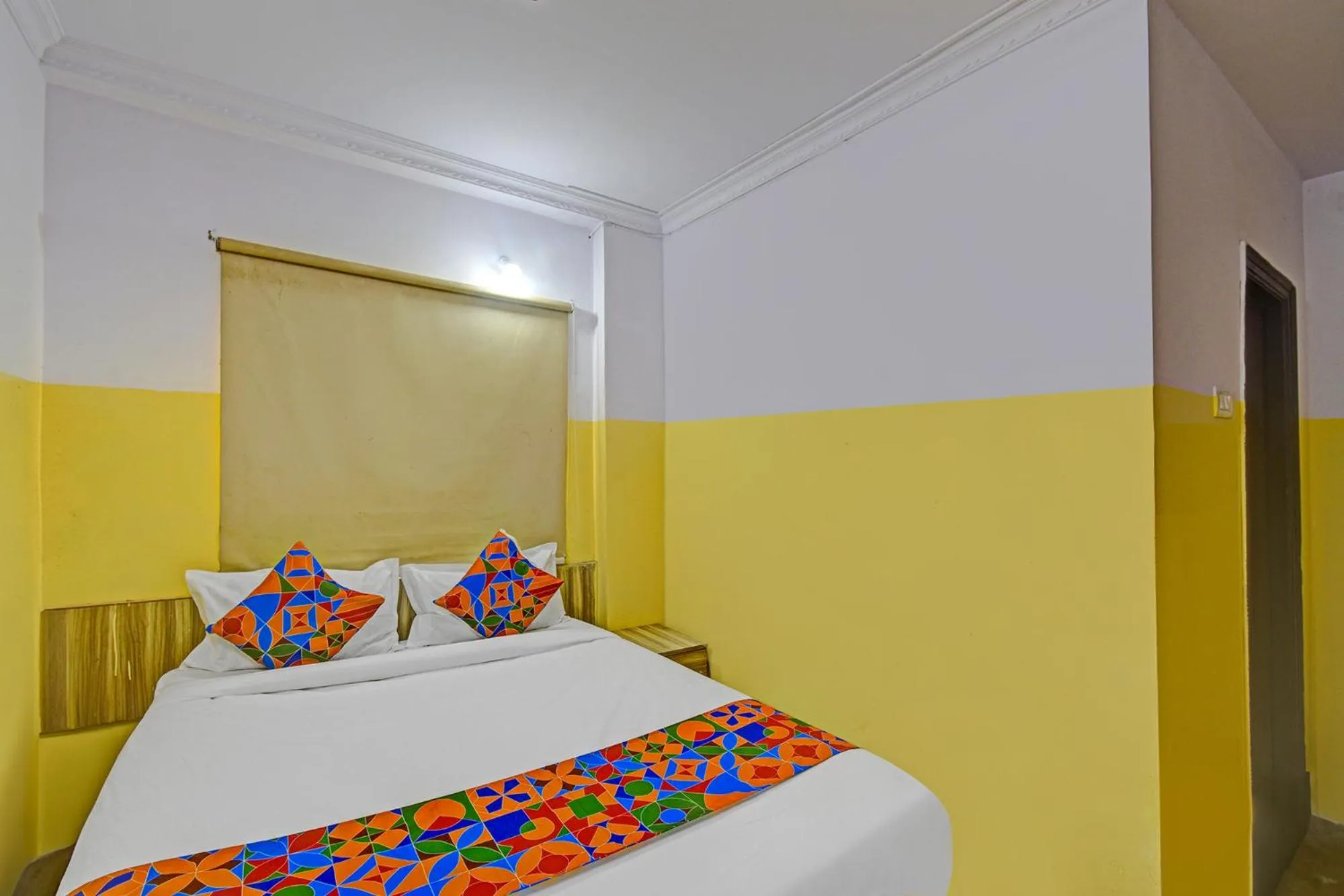 Bed in FabHotel Mohith Gokul