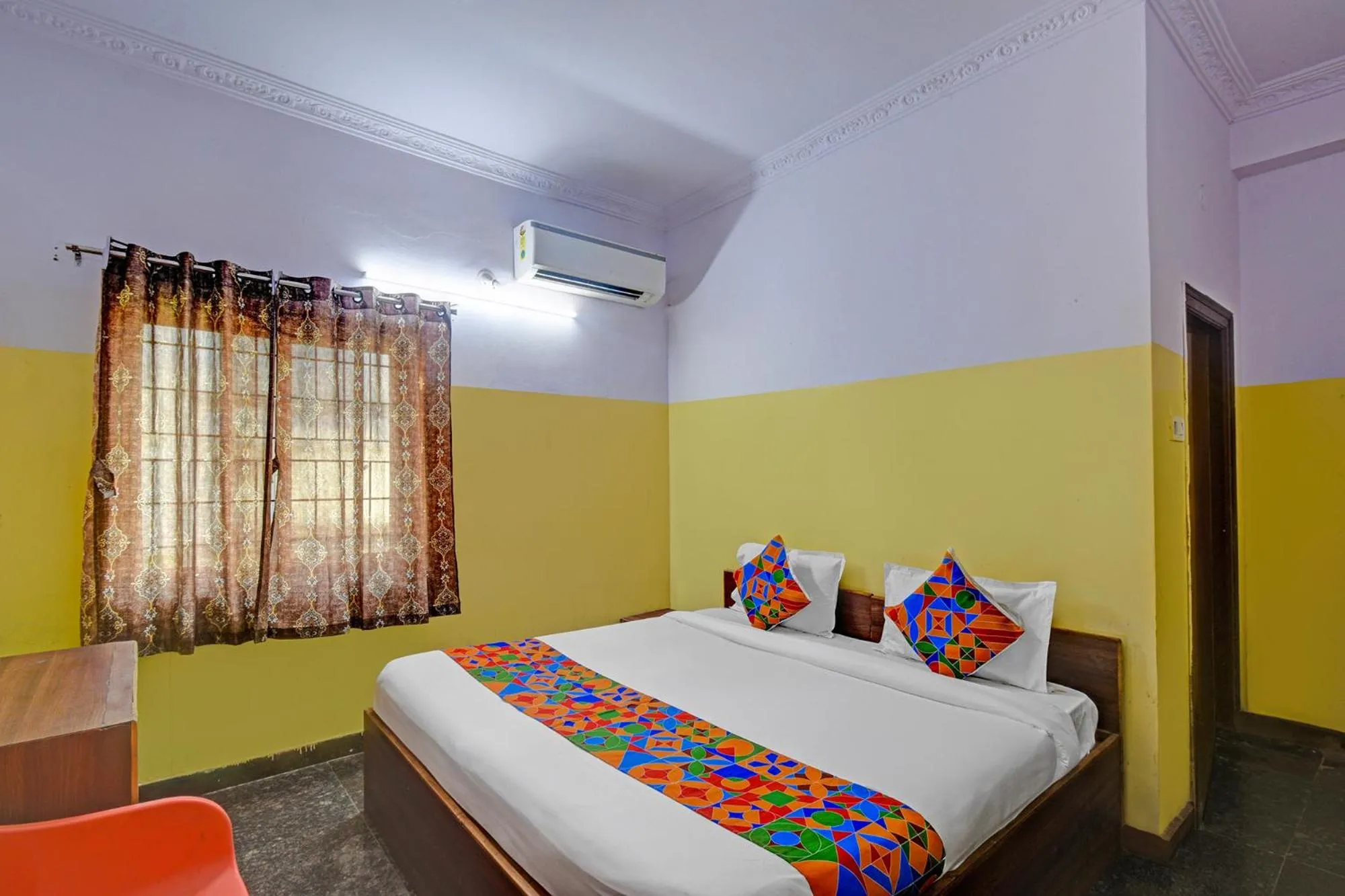 Bed in FabHotel Mohith Gokul