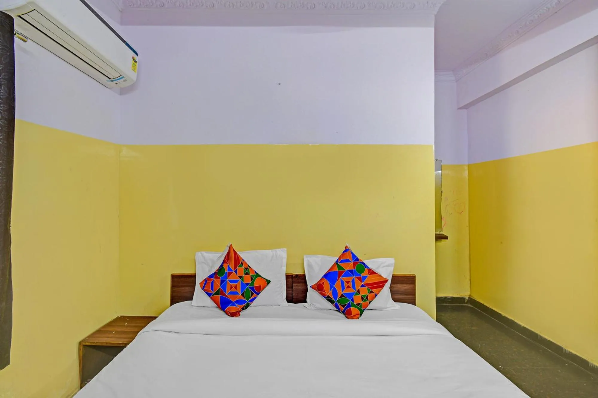 Bed in FabHotel Mohith Gokul