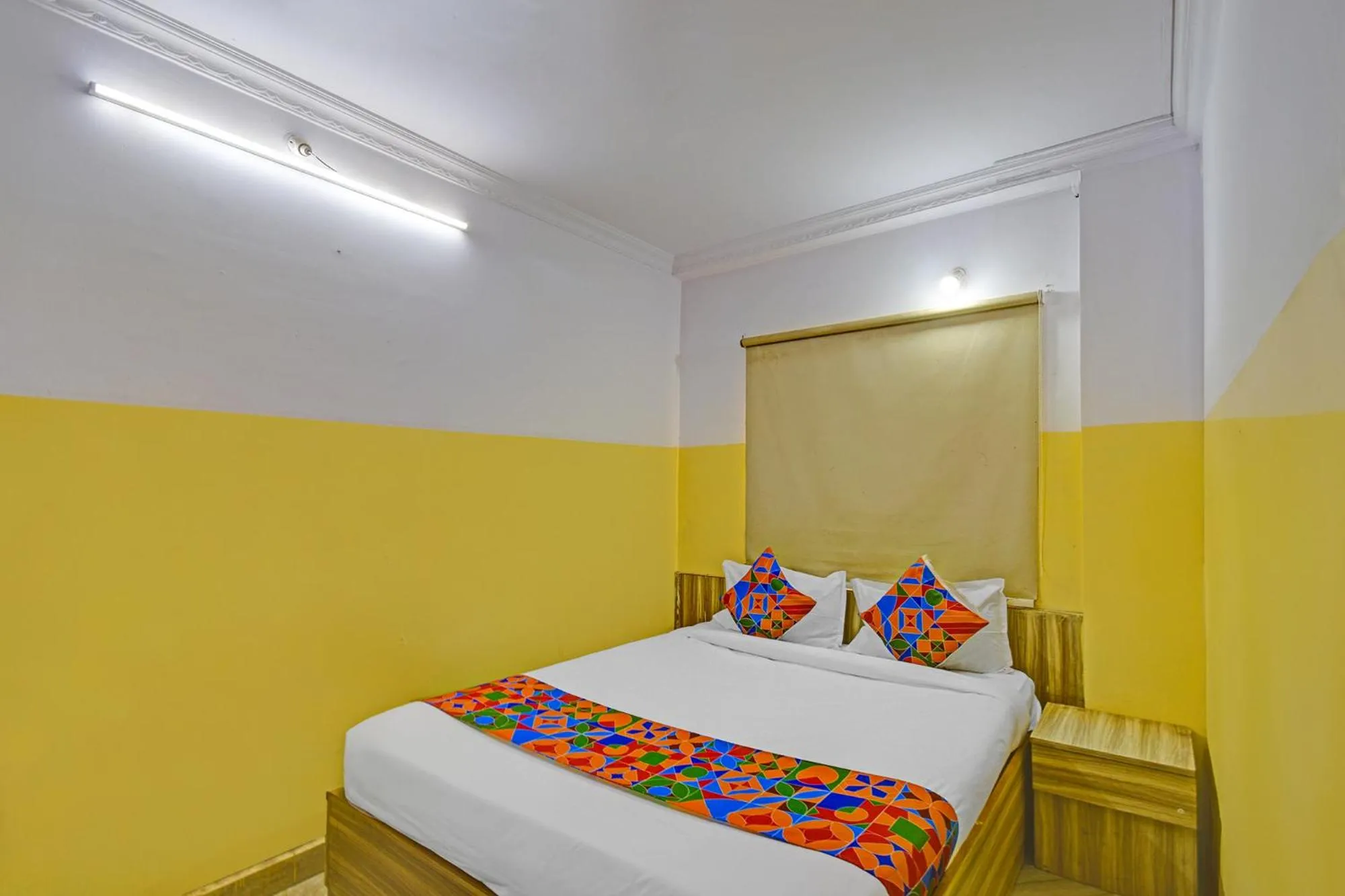 Bed in FabHotel Mohith Gokul