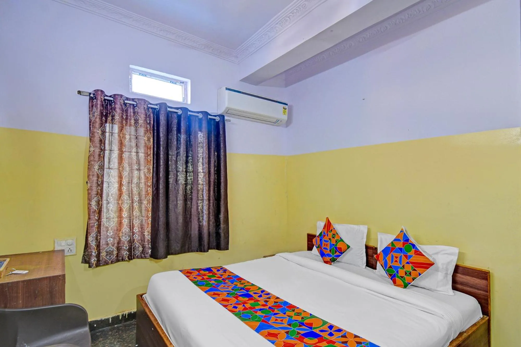 Bed in FabHotel Mohith Gokul