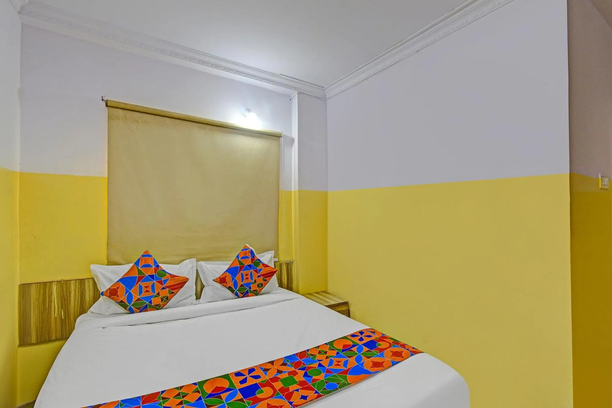 Bed in FabHotel Mohith Gokul