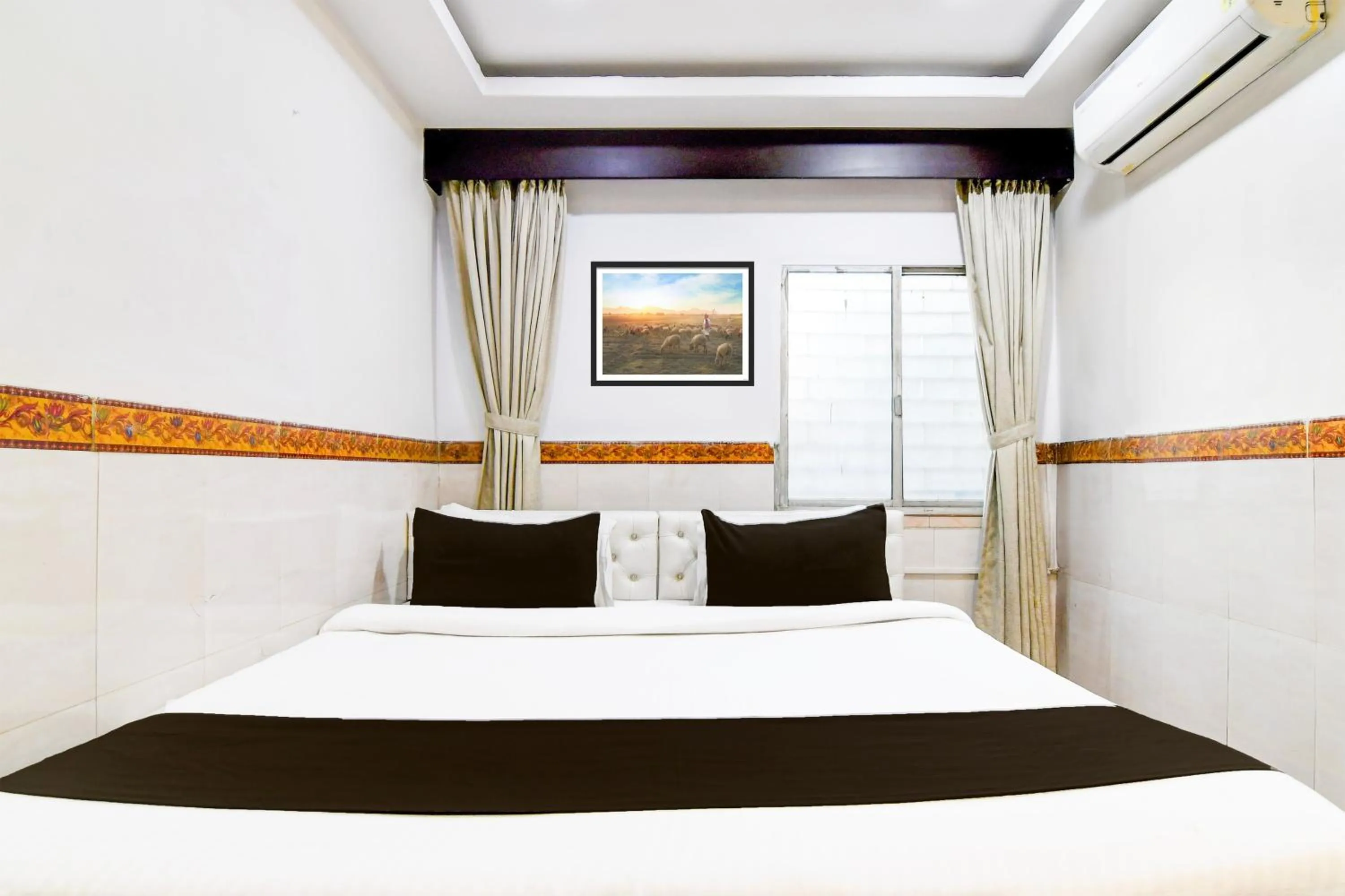 Bedroom in Super Hotel Continental Restuarant & Cafe