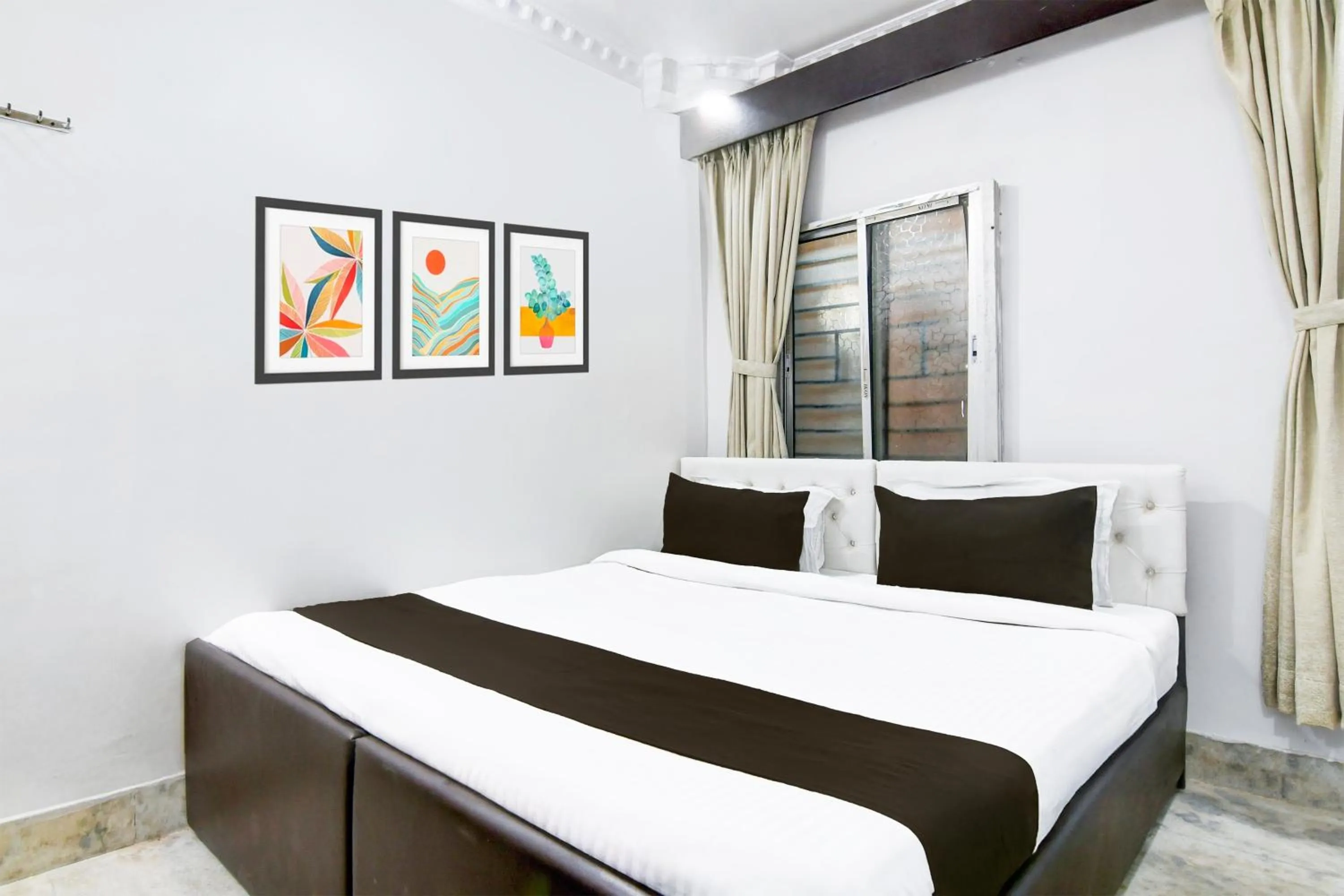 Bedroom in Super Hotel Continental Restuarant & Cafe