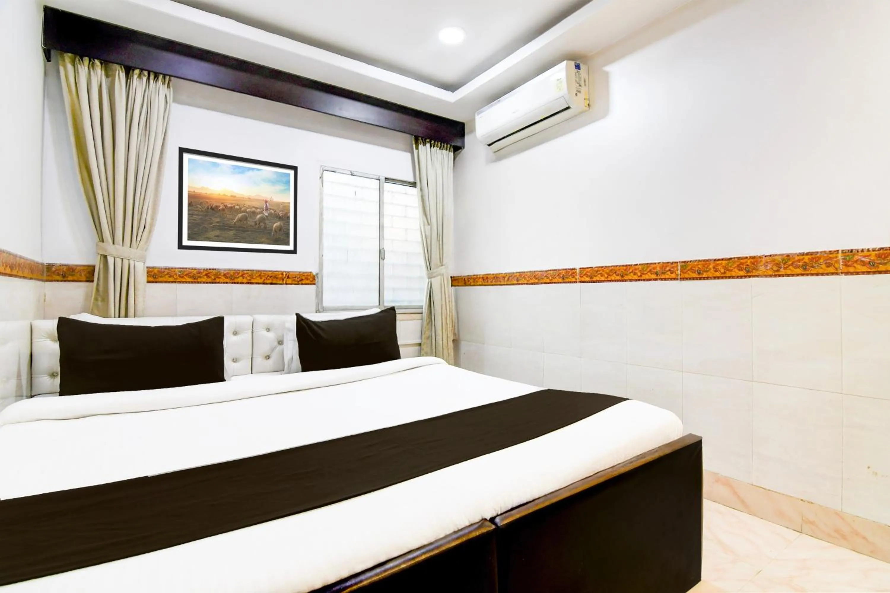 Bedroom in Super Hotel Continental Restuarant & Cafe