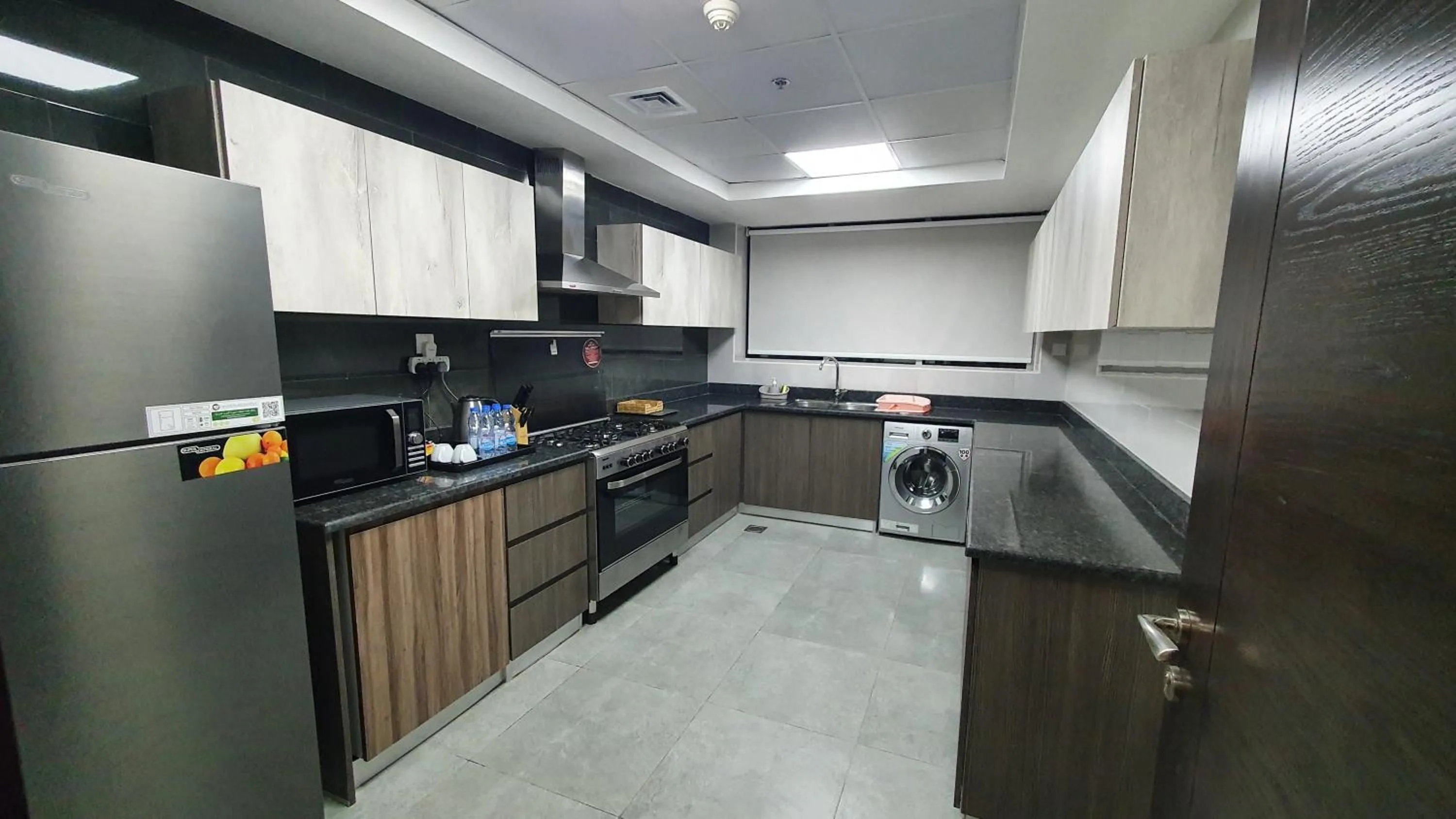 Kitchen or kitchenette in Luxe Grand Hotel Apartments