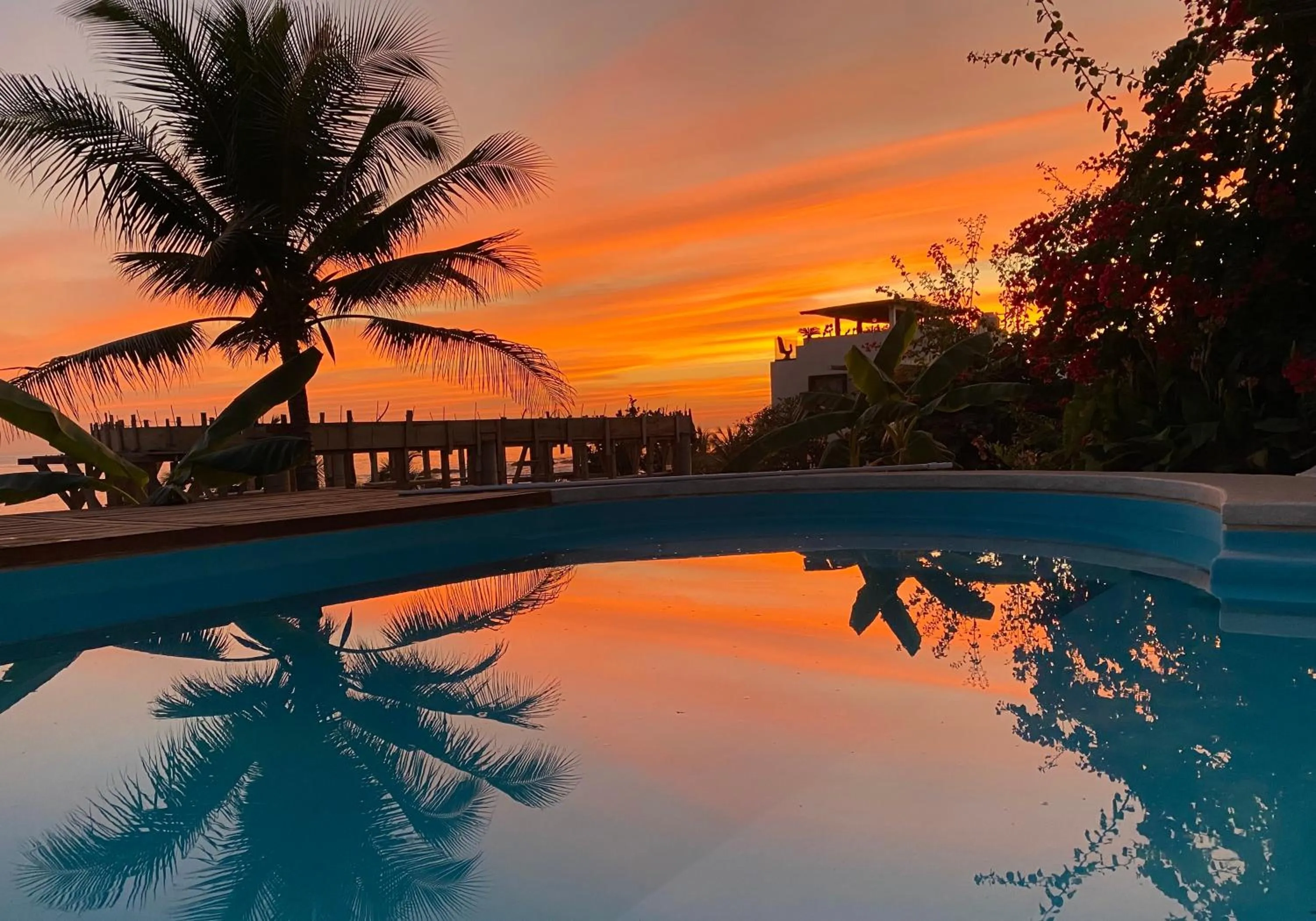 Swimming pool in Beachfront Paradise Boutique Hotel