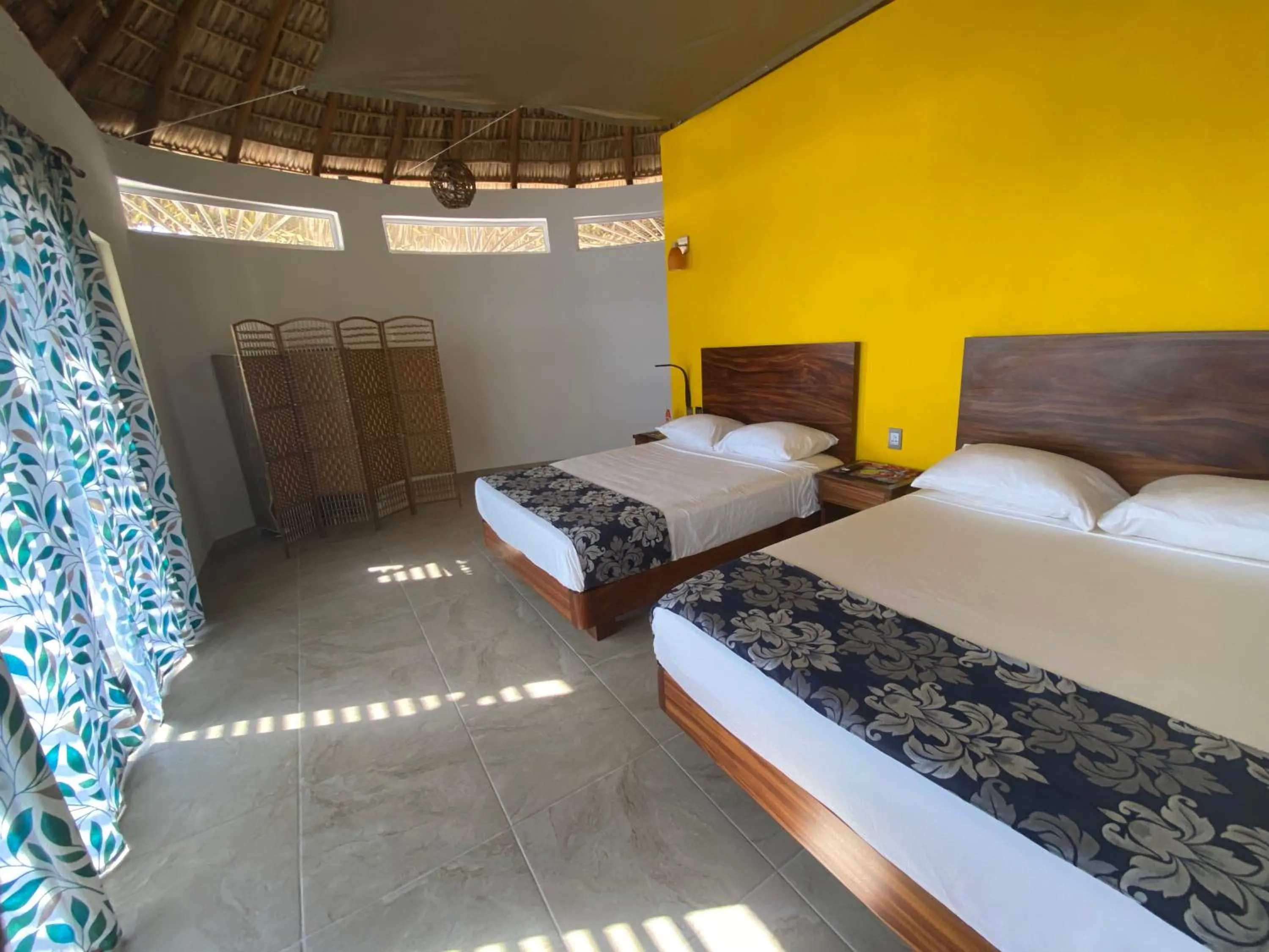 Bed in Beachfront Paradise Boutique Hotel