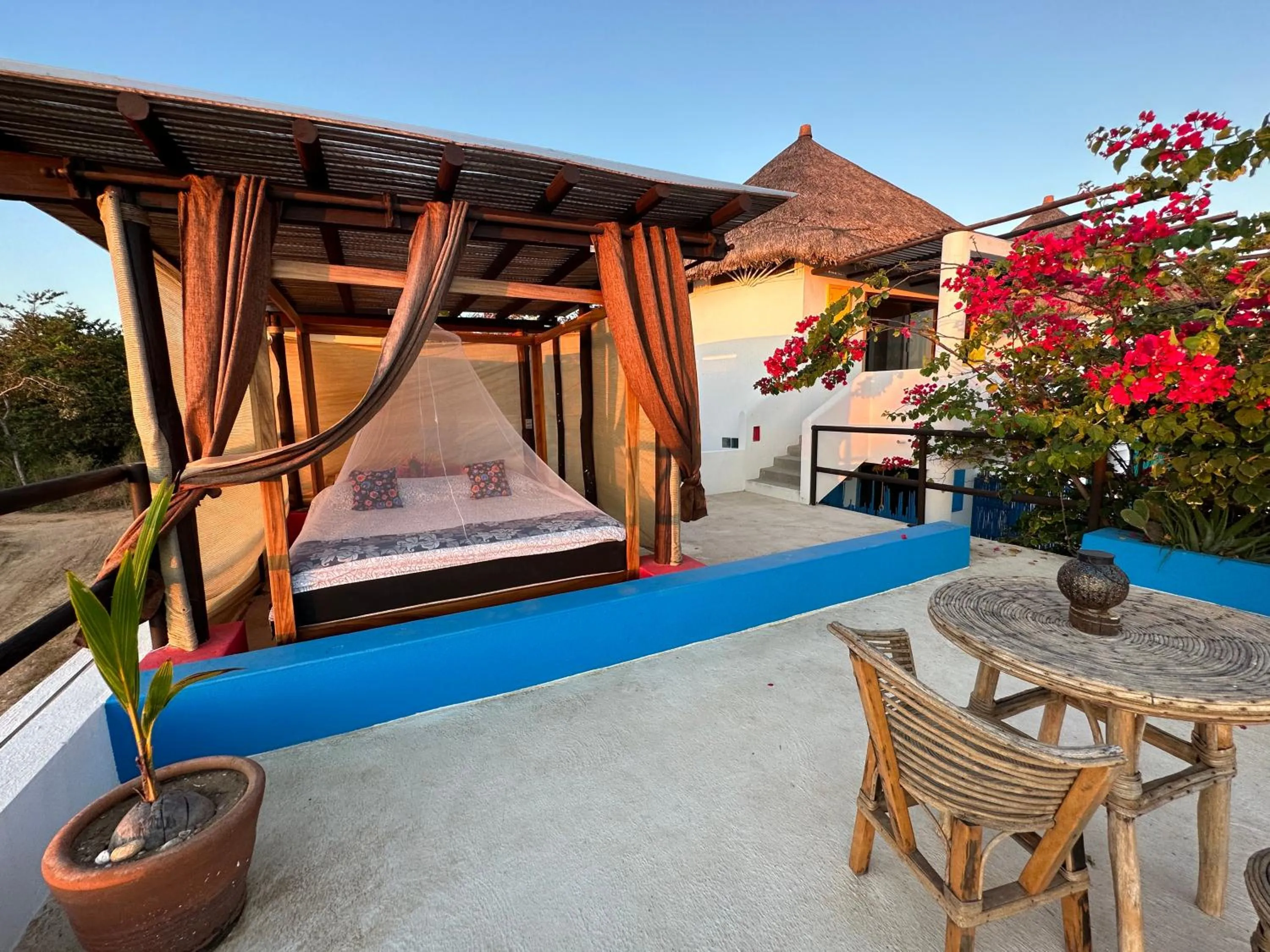 Balcony/Terrace, Bed in Beachfront Paradise Boutique Hotel