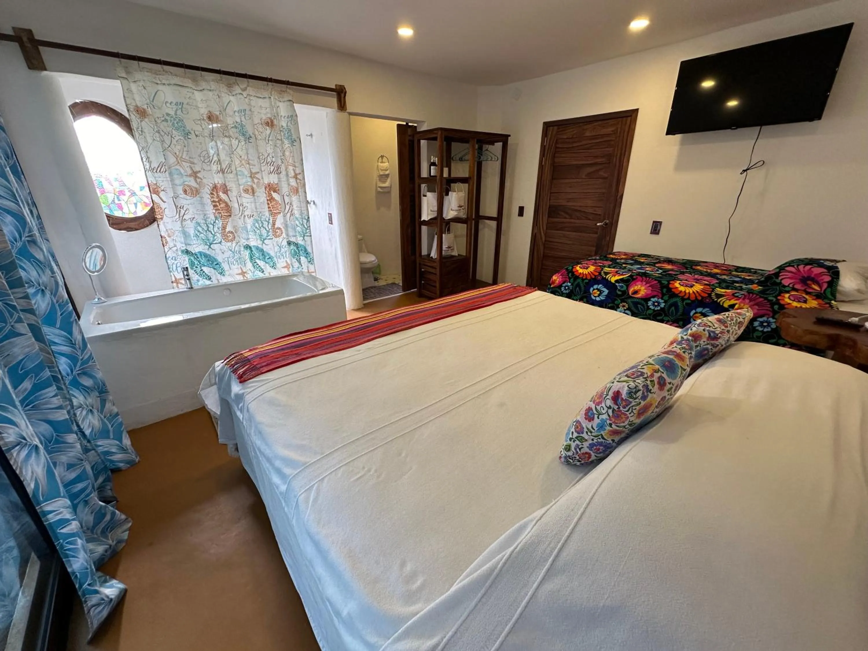 Bed in Beachfront Paradise Boutique Hotel