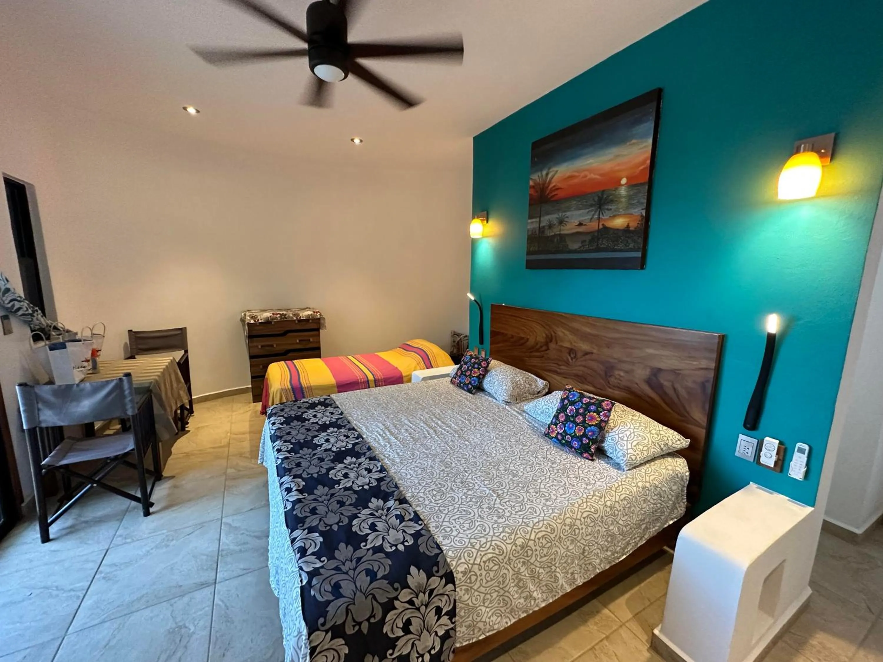 Photo of the whole room, Bed in Beachfront Paradise Boutique Hotel