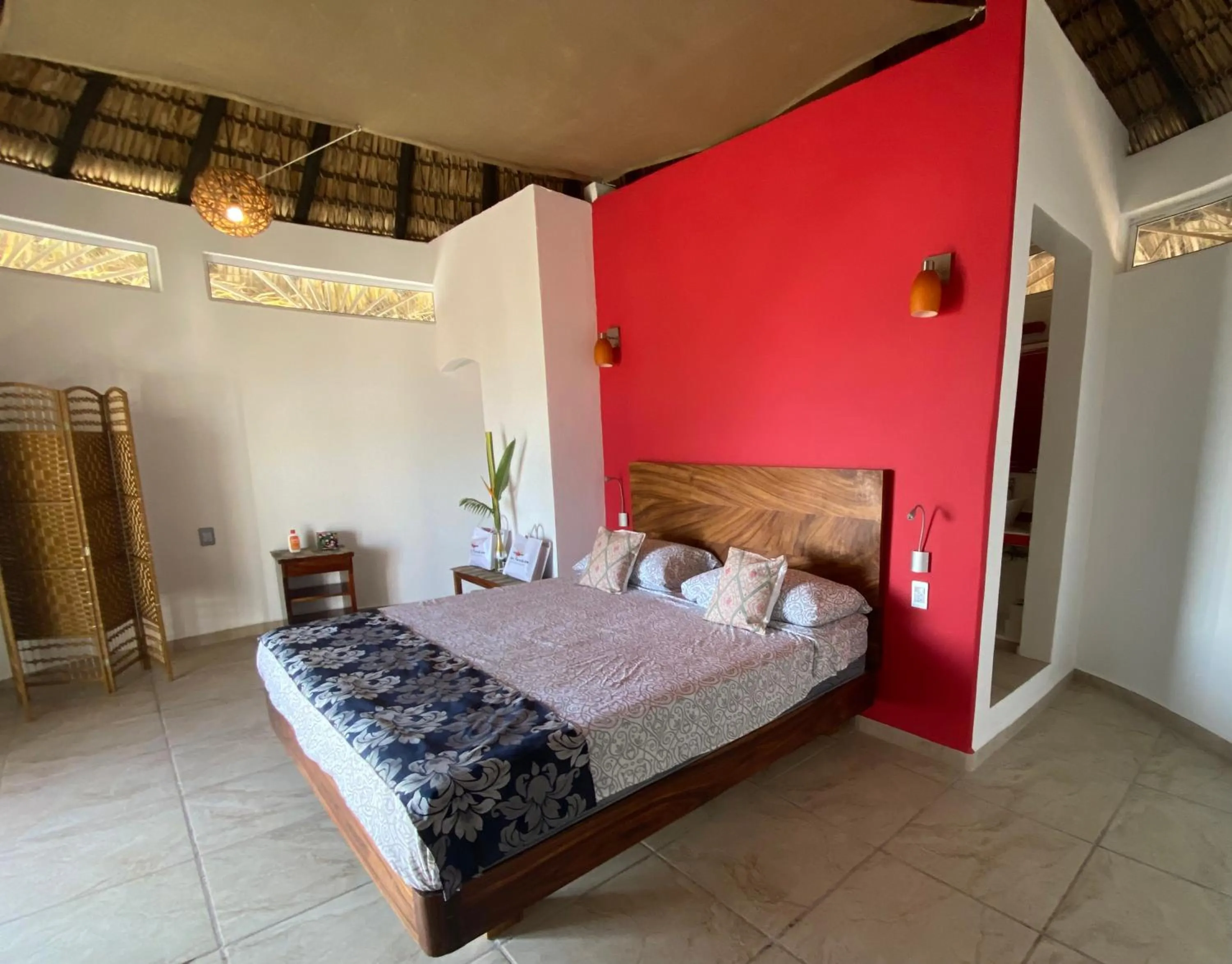 Photo of the whole room, Bed in Beachfront Paradise Boutique Hotel