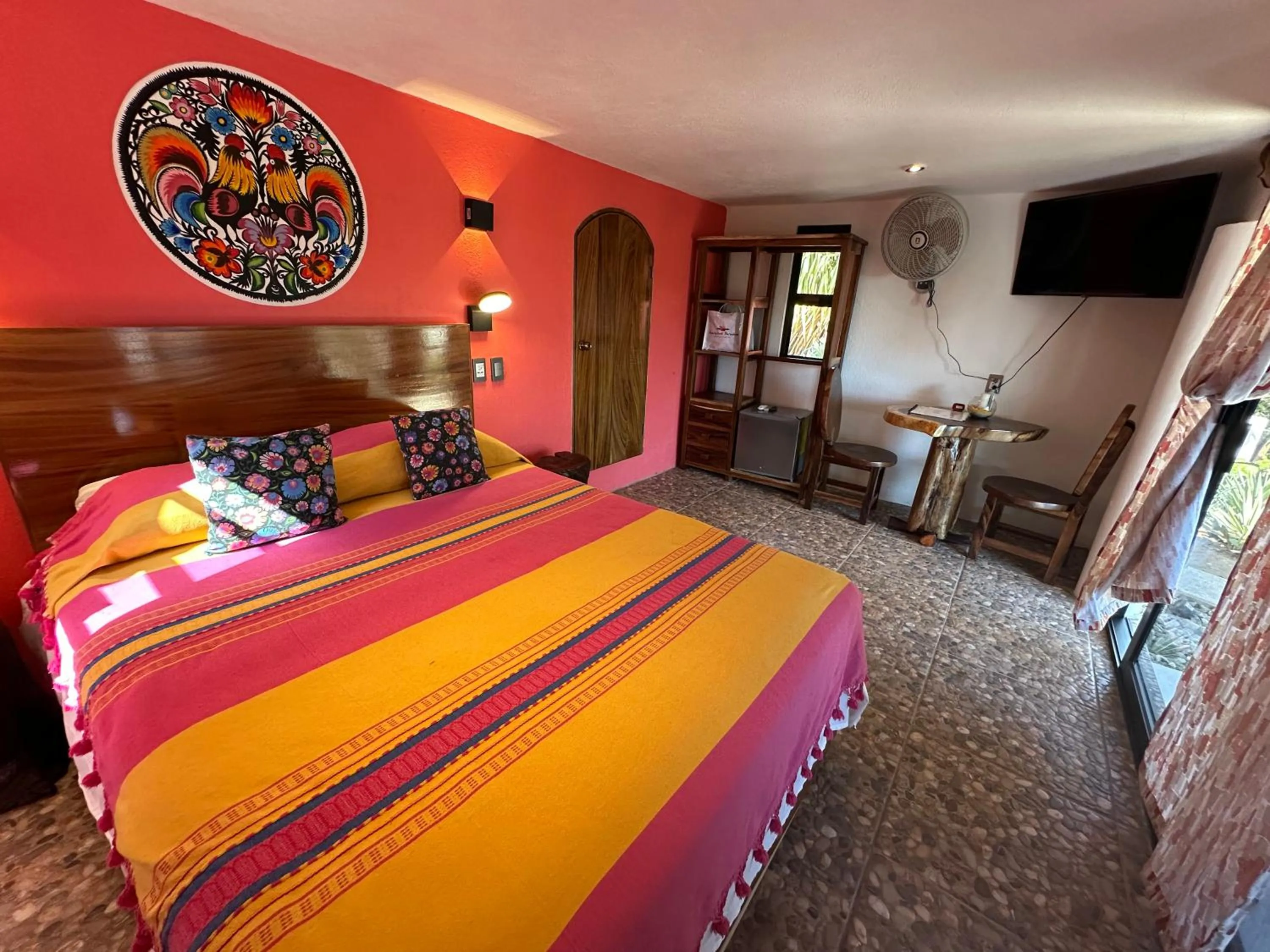 Photo of the whole room, Bed in Beachfront Paradise Boutique Hotel