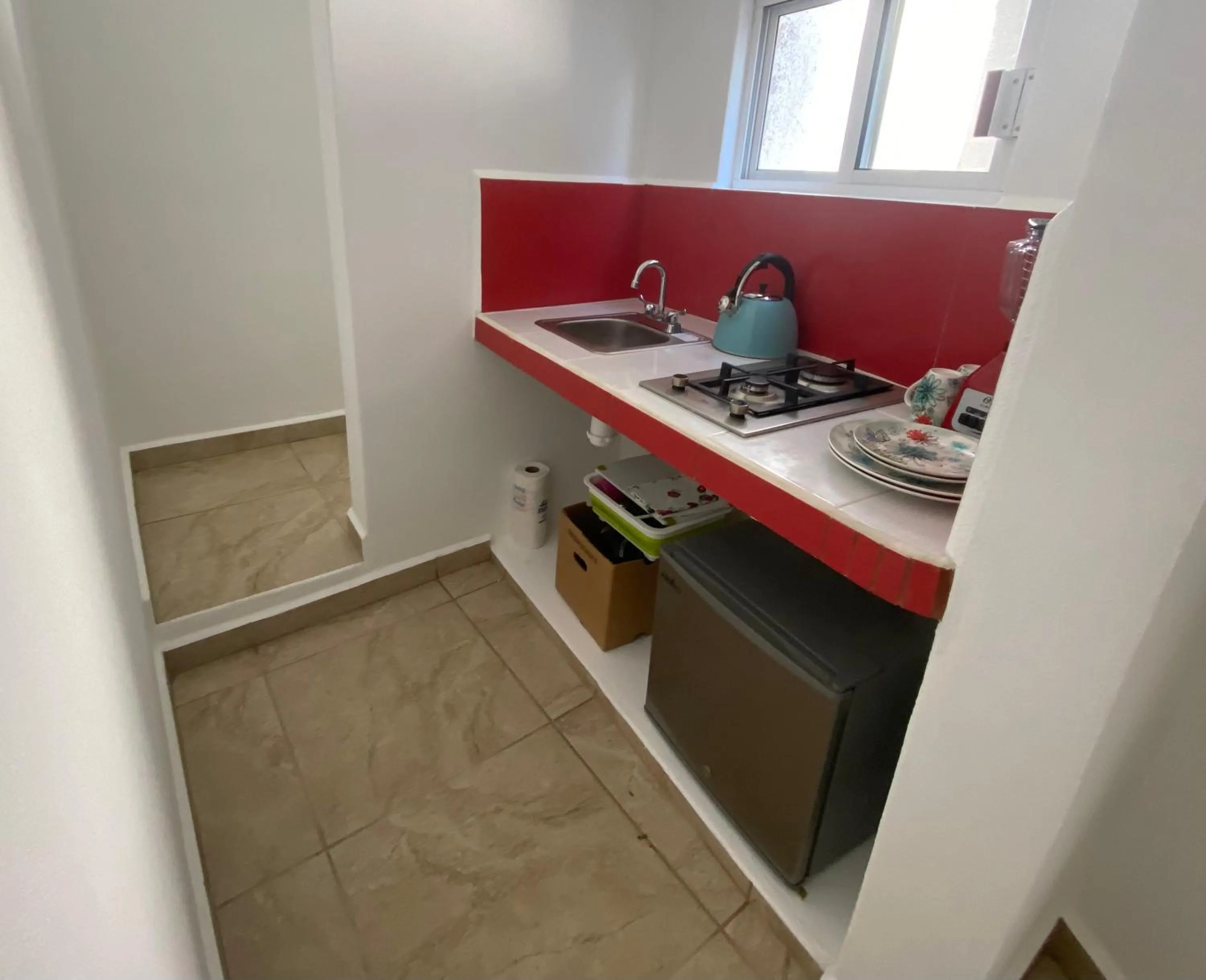 Kitchen or kitchenette in Beachfront Paradise Boutique Hotel