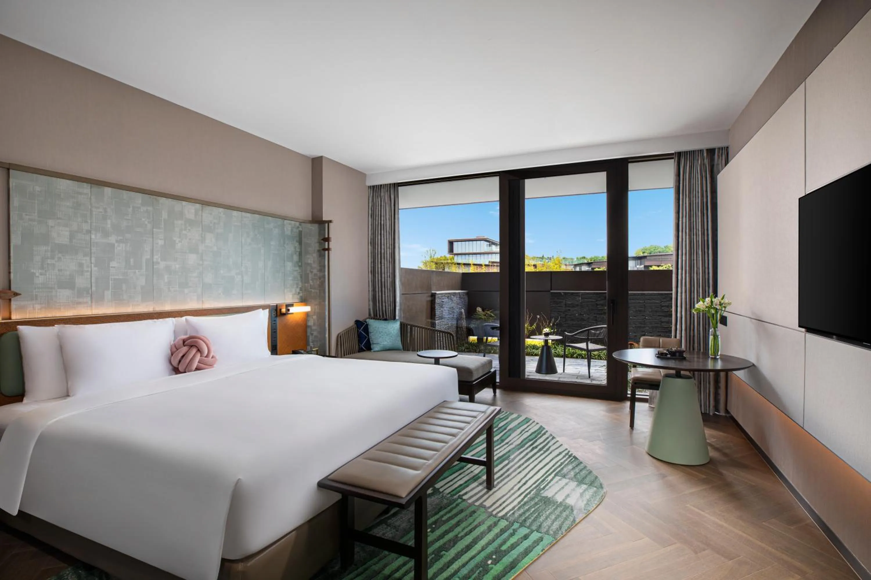 Bed in Hotel Indigo Suzhou Yangcheng Lake by IHG