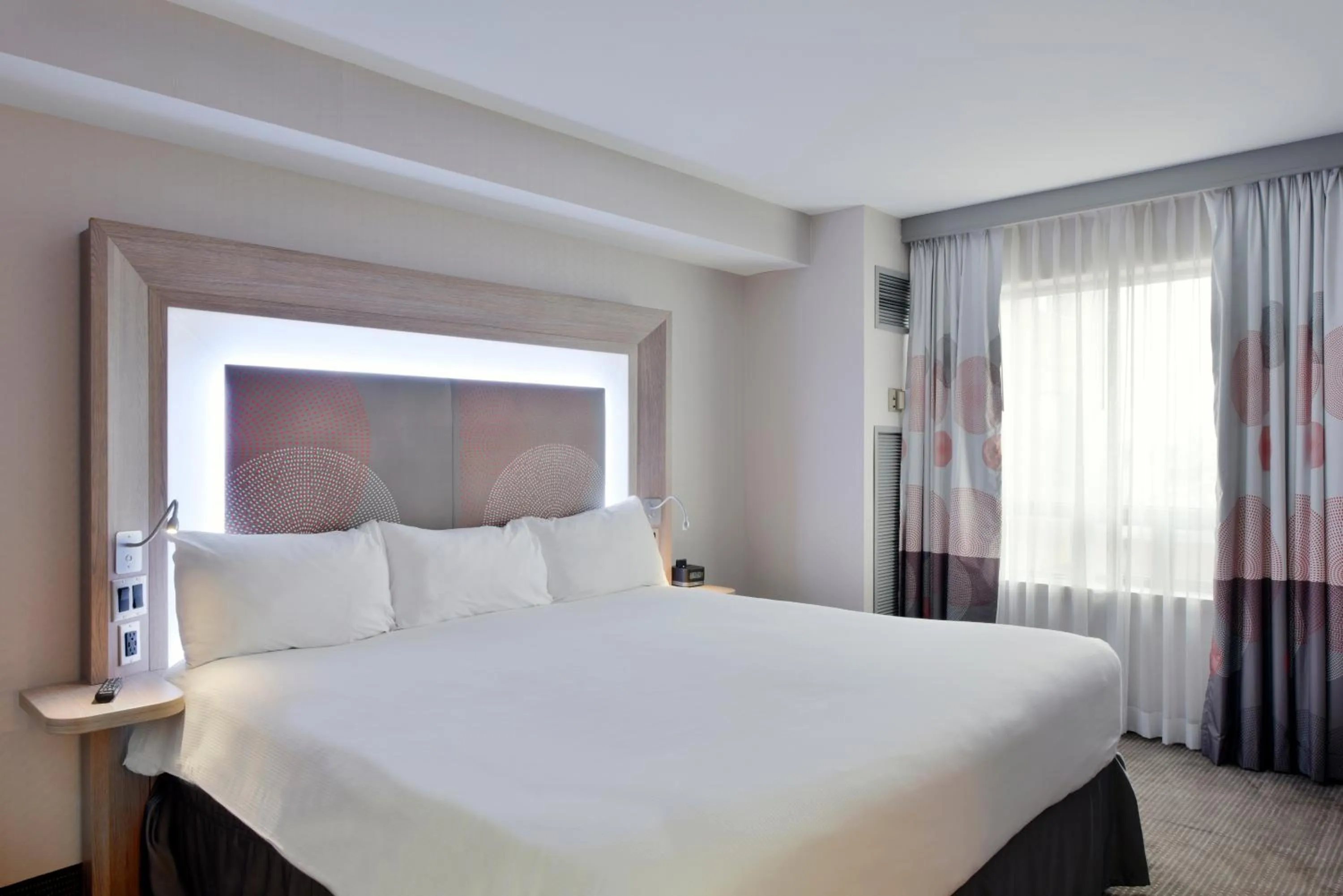 Bed in Novotel Ottawa City Centre Hotel