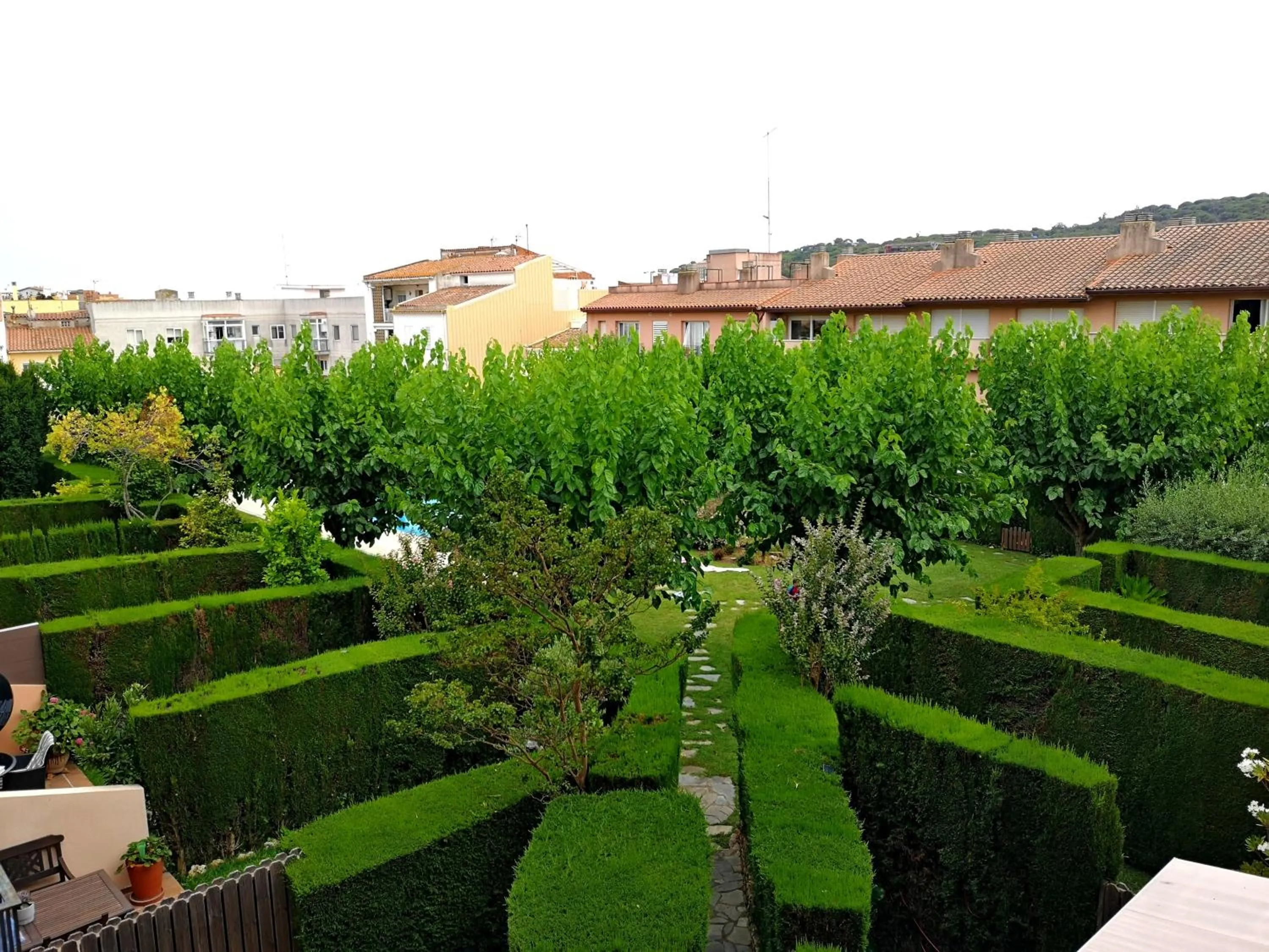 Garden in LLOGUER30 Apartamento Lotus, piscina y parquing
