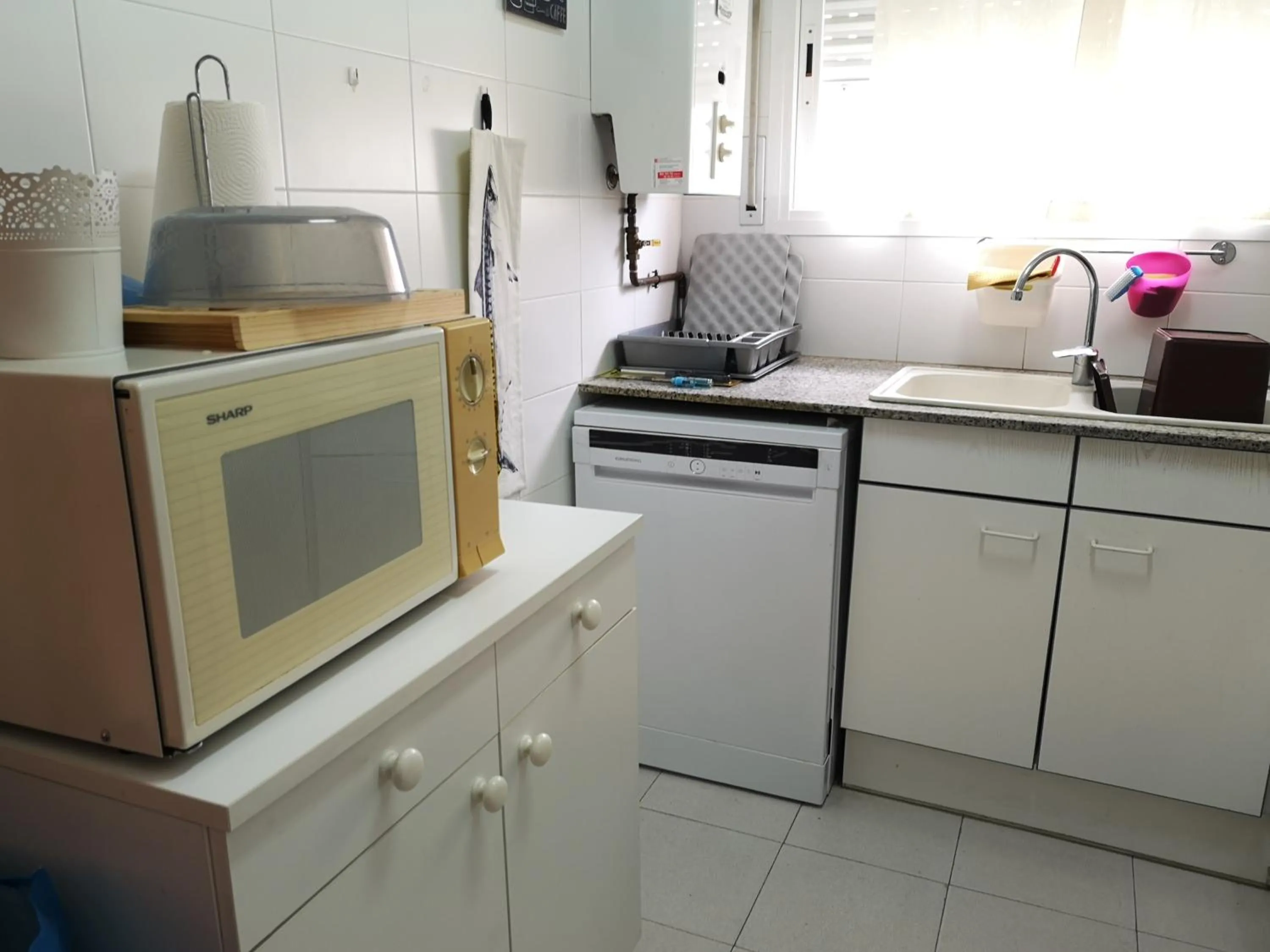 Kitchen or kitchenette in LLOGUER30 Apartamento Lotus, piscina y parquing
