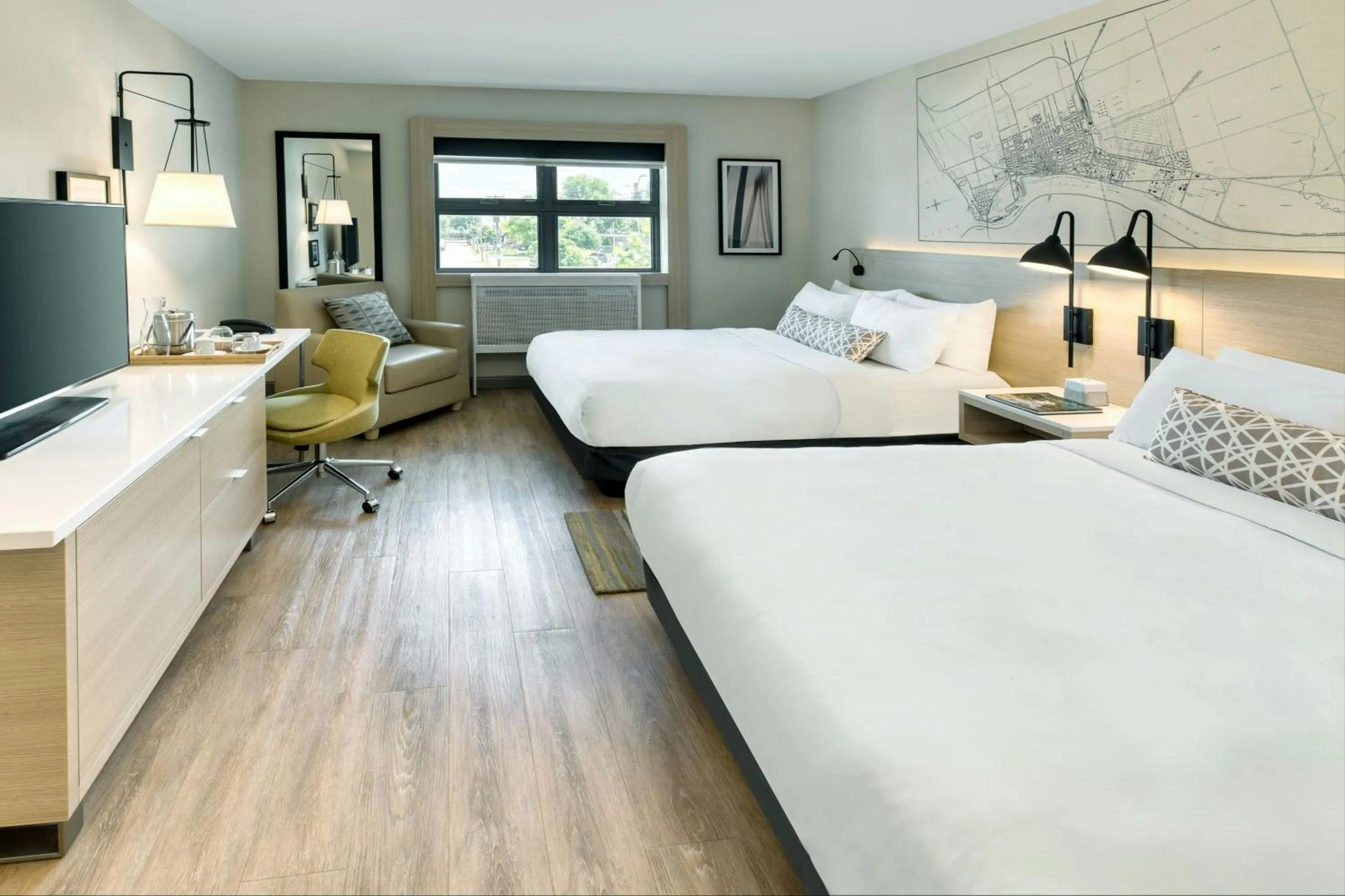 Photo of the whole room, Bed in The Insignia Hotel, Sarnia, a Tribute Portfolio Hotel