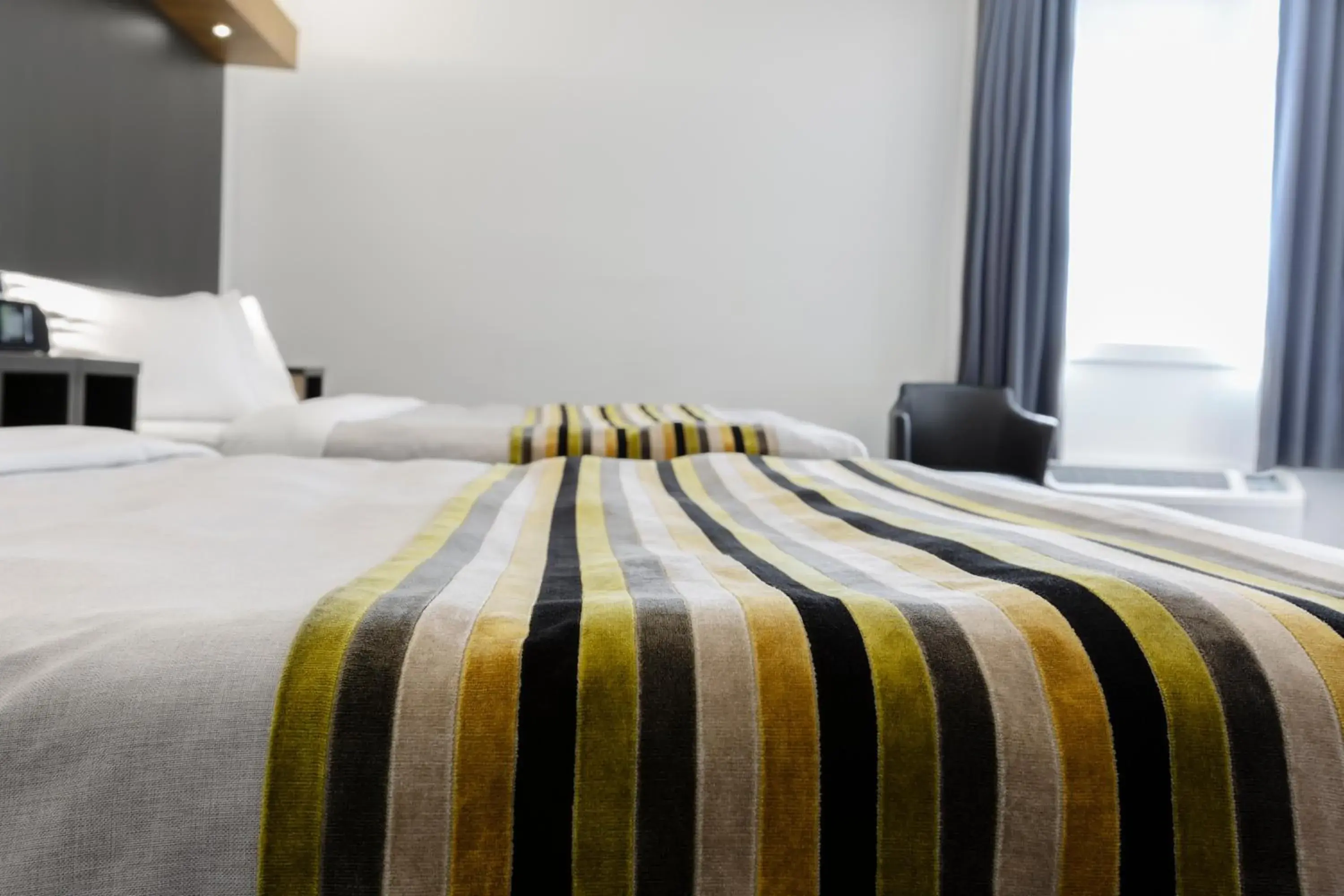 Queen Room with Two Queen Beds in Hotel Le Littoral Queen Room with Two Queen Beds in Hotel Le Littoral