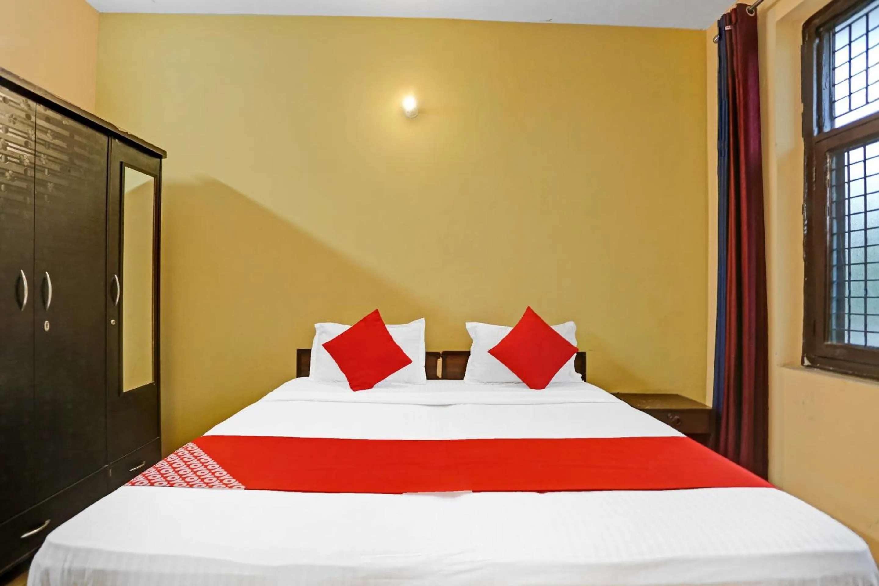 Bedroom in Hotel O Prince Residency
