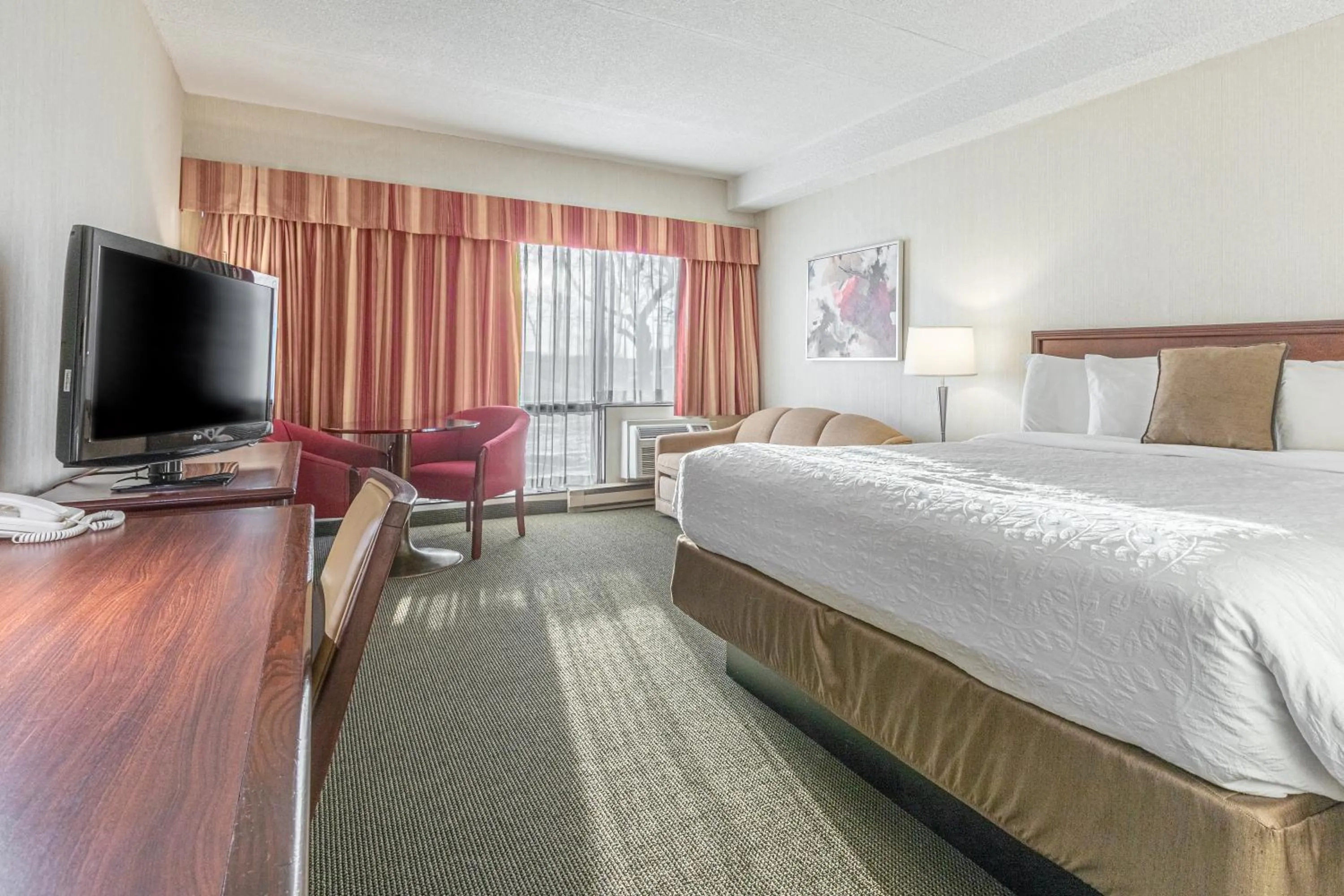 Bed in Hôtel WelcomInns