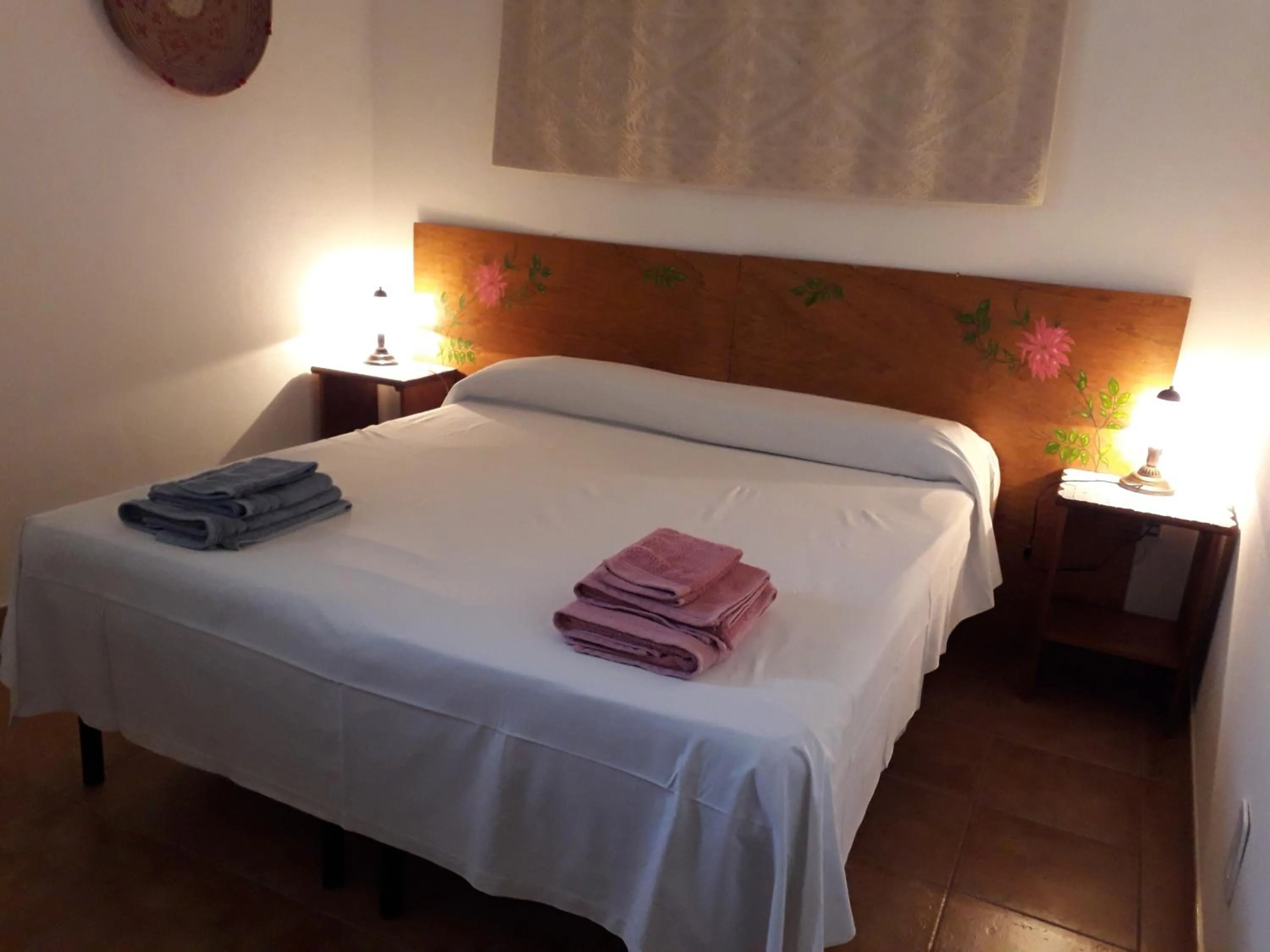 Photo of the whole room, Bed in Canne Al Vento