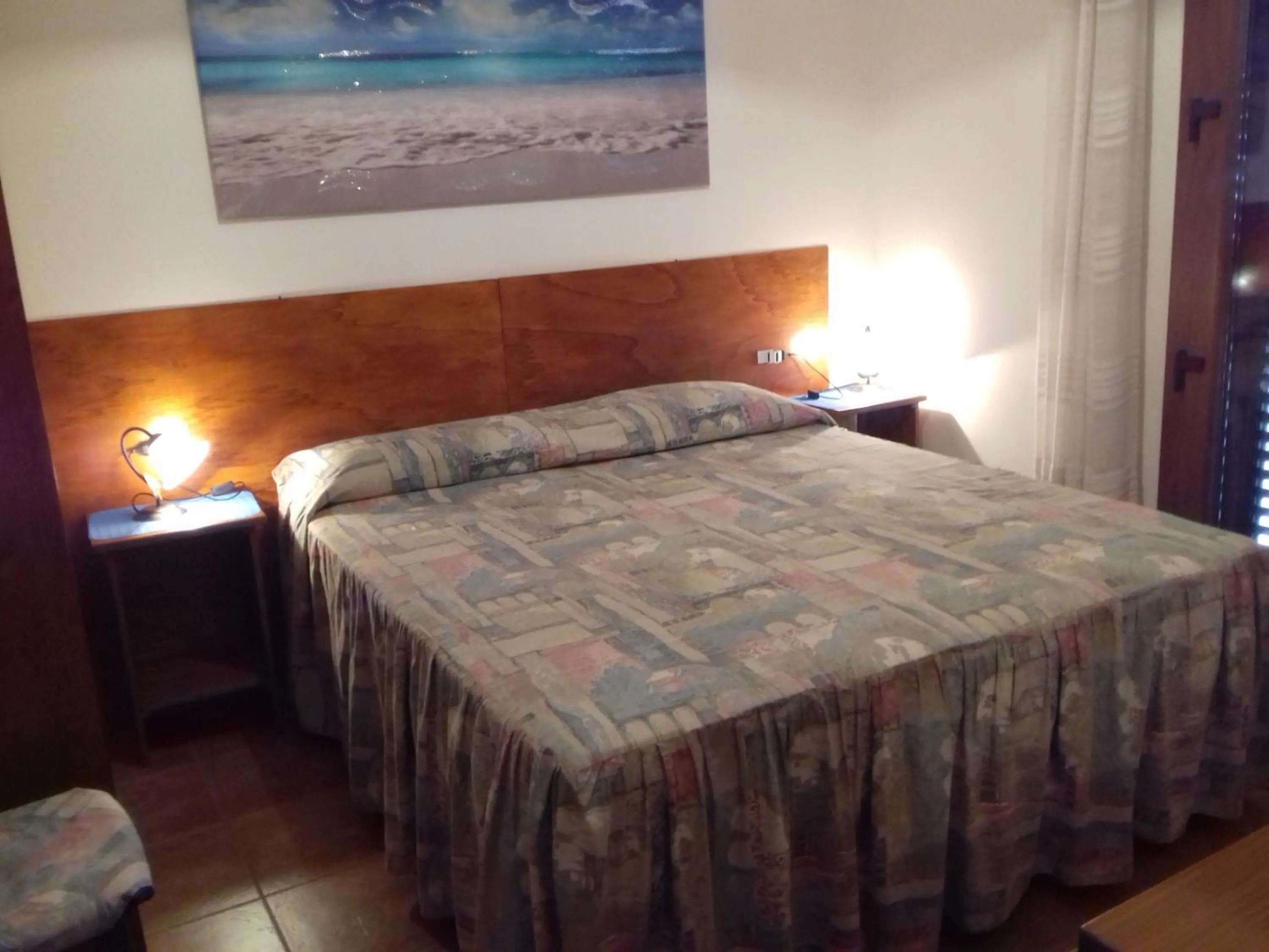 Photo of the whole room, Bed in Canne Al Vento