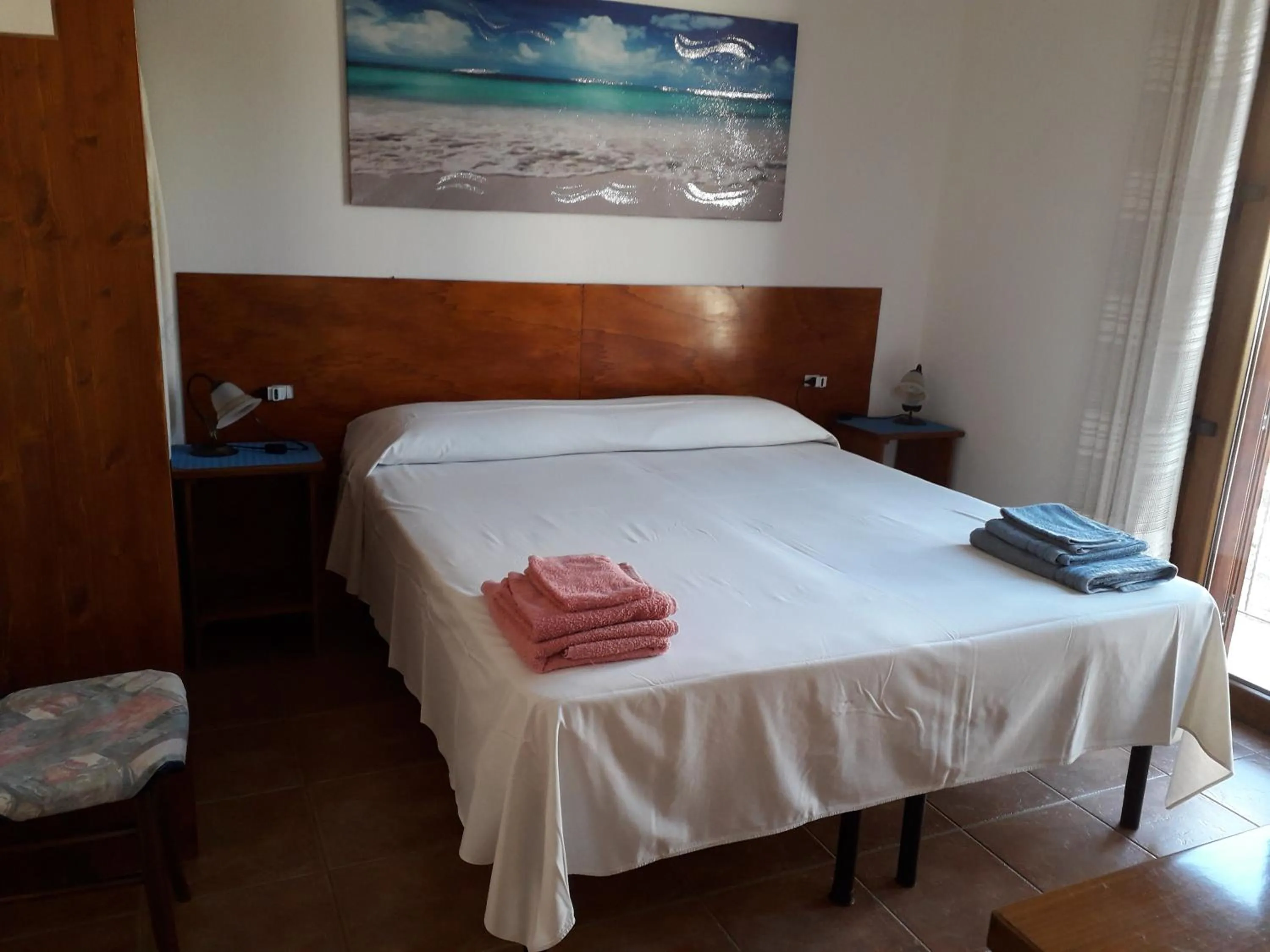 Photo of the whole room, Bed in Canne Al Vento
