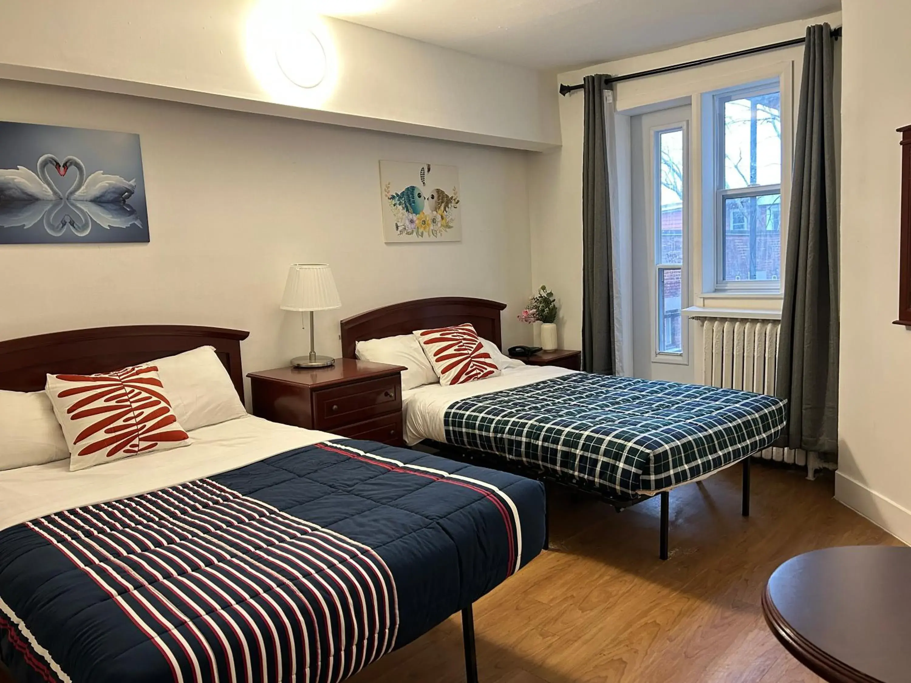 Double Room with Two Double Beds in Hotel La Residence du Voyageur Double Room with Two Double Beds in Hotel La Residence du Voyageur